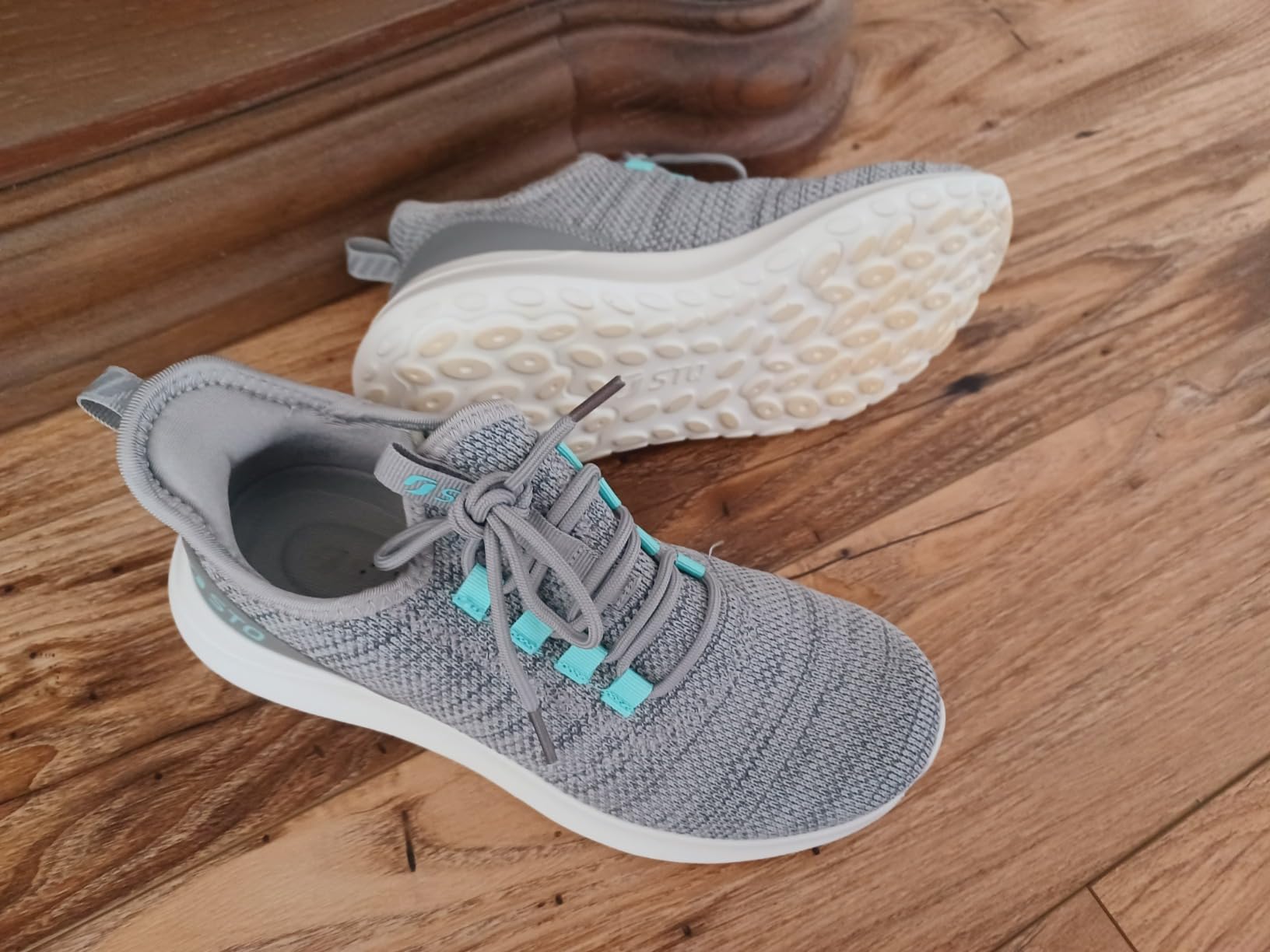 STQ women's sneakers final assessment showing complete shoe design and overall quality