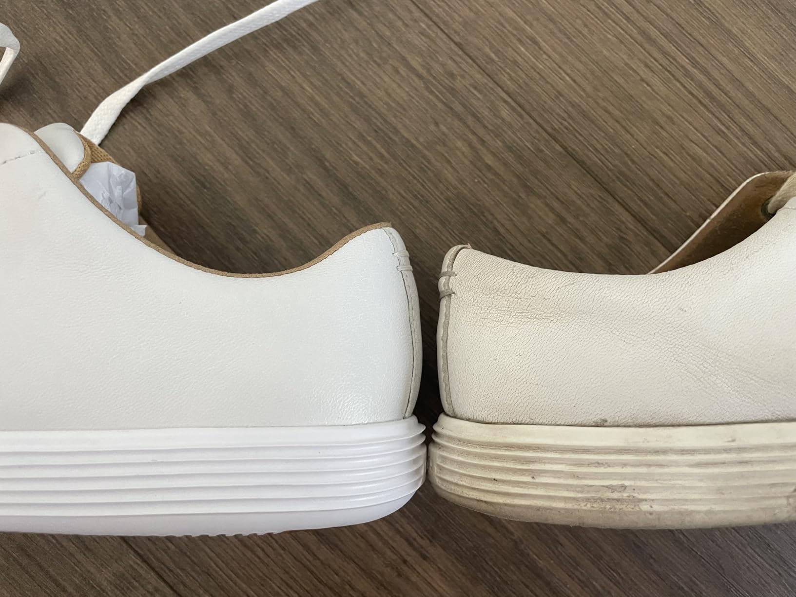 Cole Haan Women's Grand Crosscourt white leather sneaker minimalist design side profile
