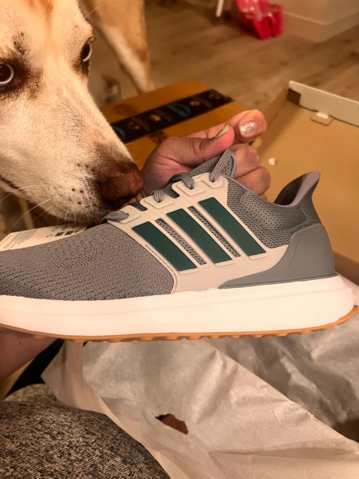 Adidas Ubounce DNA showing material quality and open knit weave structure in natural outdoor lighting