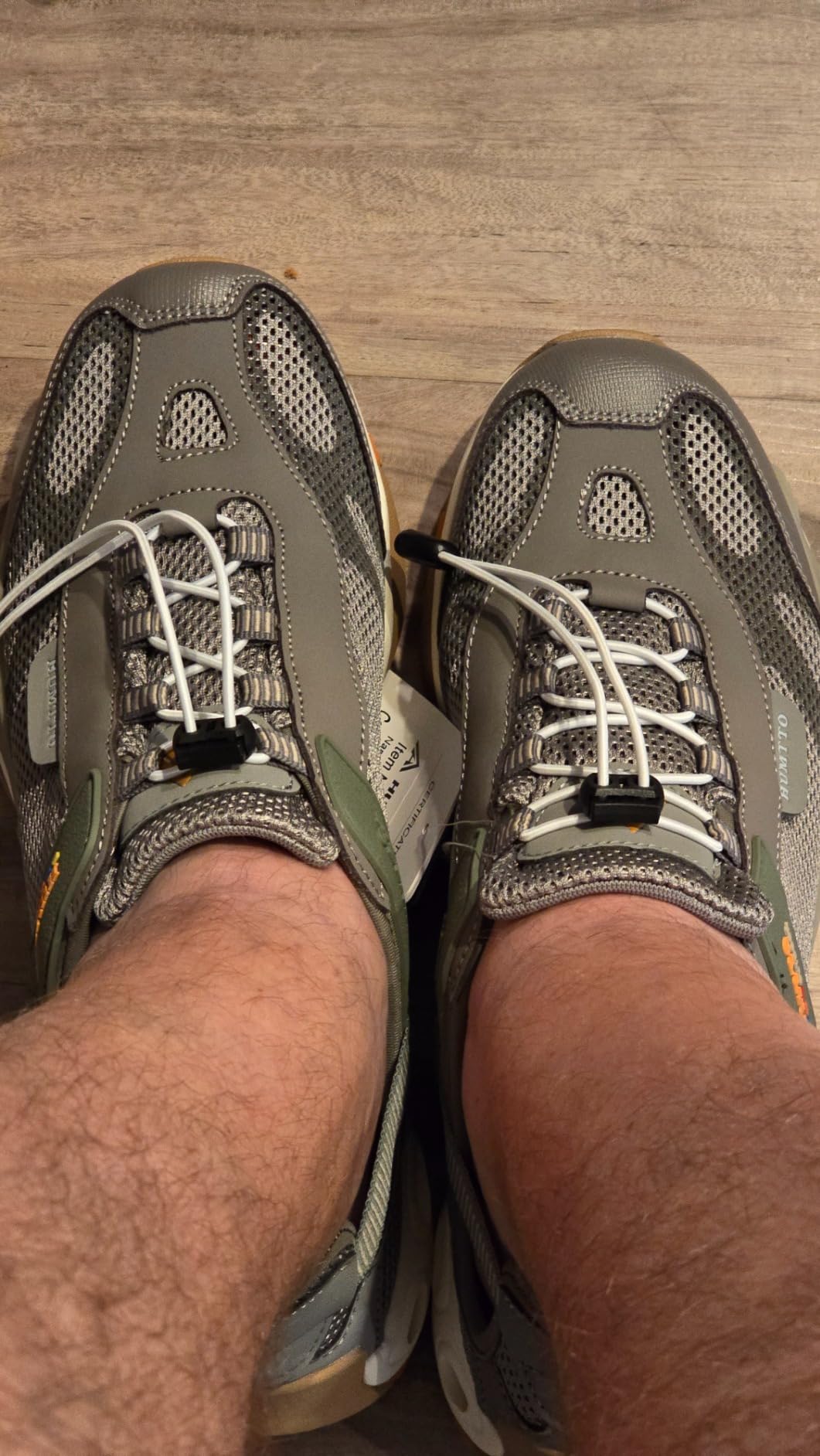 Close-up of HUMTTO rubber sole showing tread pattern and drainage holes
