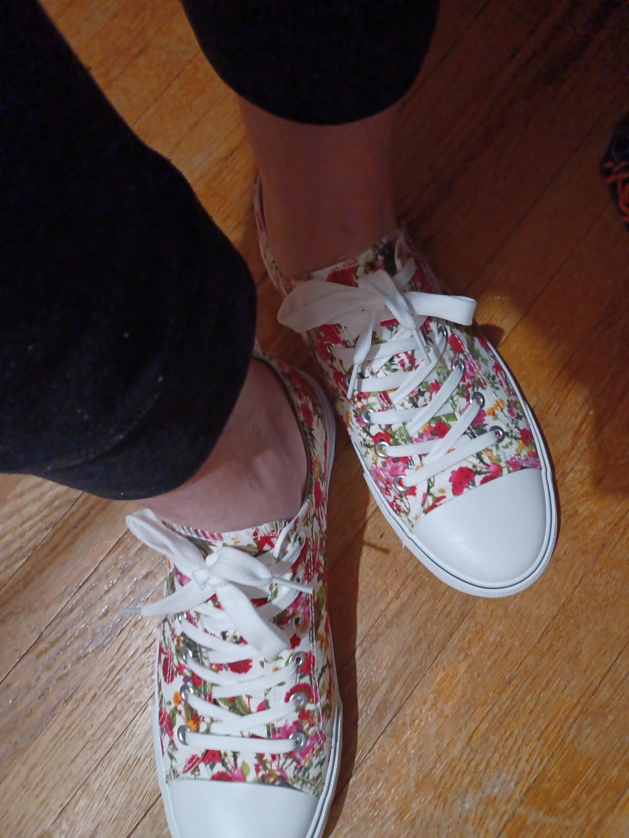 Close-up of Adokoo canvas sneaker floral print detail showing fabric weave quality and print vibrancy