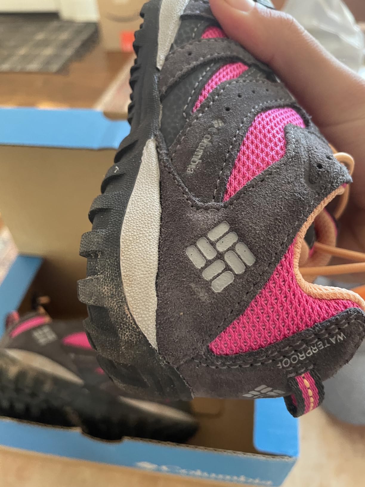 Columbia Redmond waterproof hiking shoes in action on outdoor trail showing real-world performance