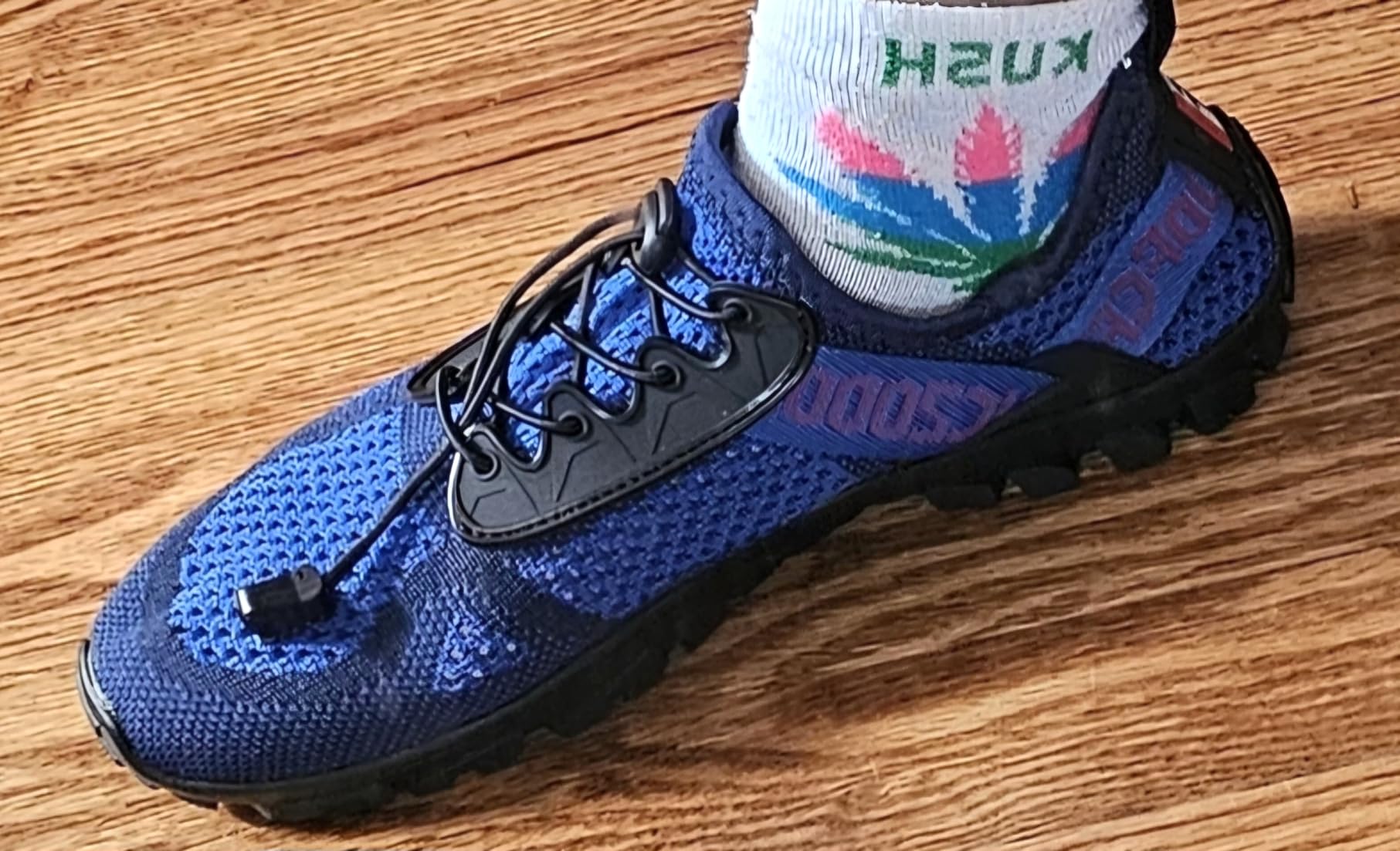SOBASO water shoes tested on varied terrain including rocky surfaces and beach sand