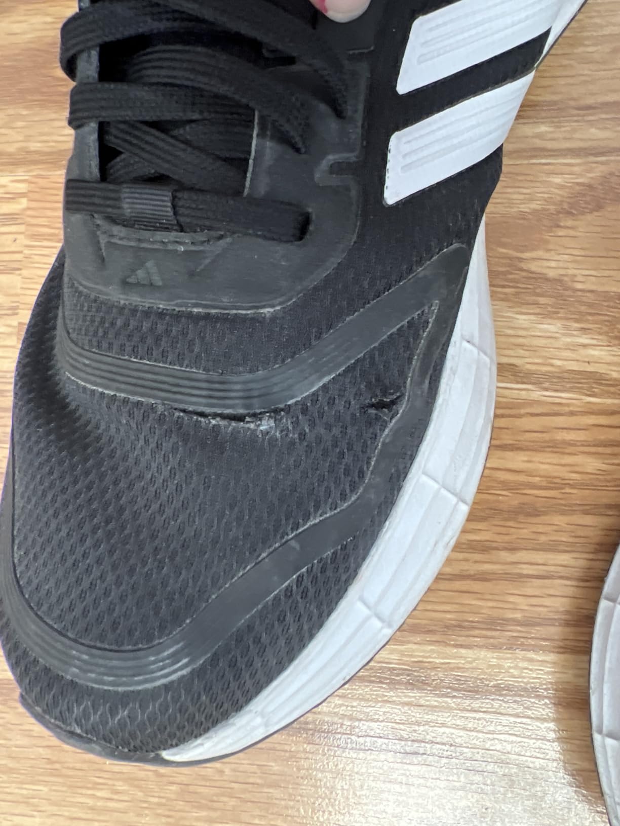 Detailed construction view of Adidas Duramo SL 2.0 showing quality control and build materials after real-world testing