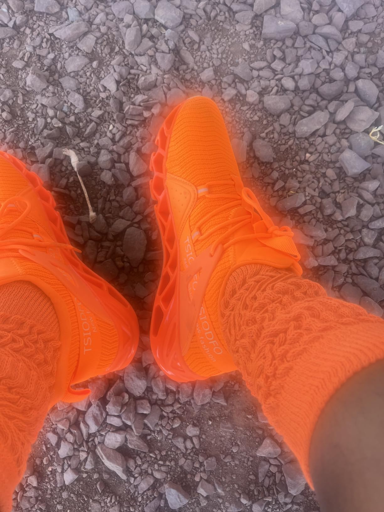 Woman wearing Ezkrwxn sneakers during daily activities showing practical comfort