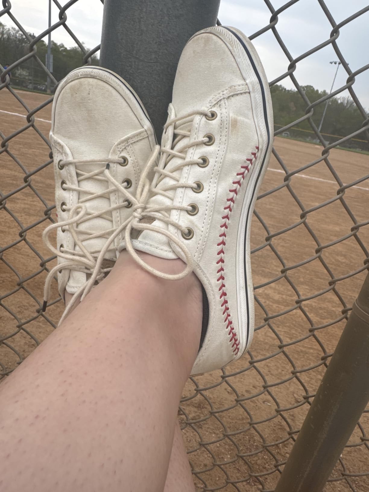 Keds Women's Kickstart Pennant sneakers in cream colorway showing baseball stitch detailing and overall silhouette
