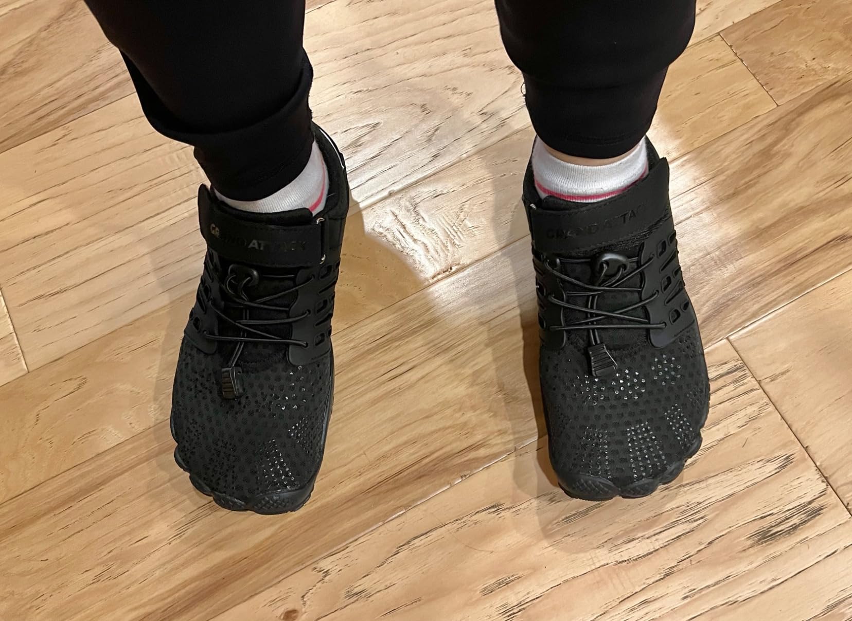 Grand Attack Women's Barefoot Shoes black cross-trainer showing wide toe box and zero drop design