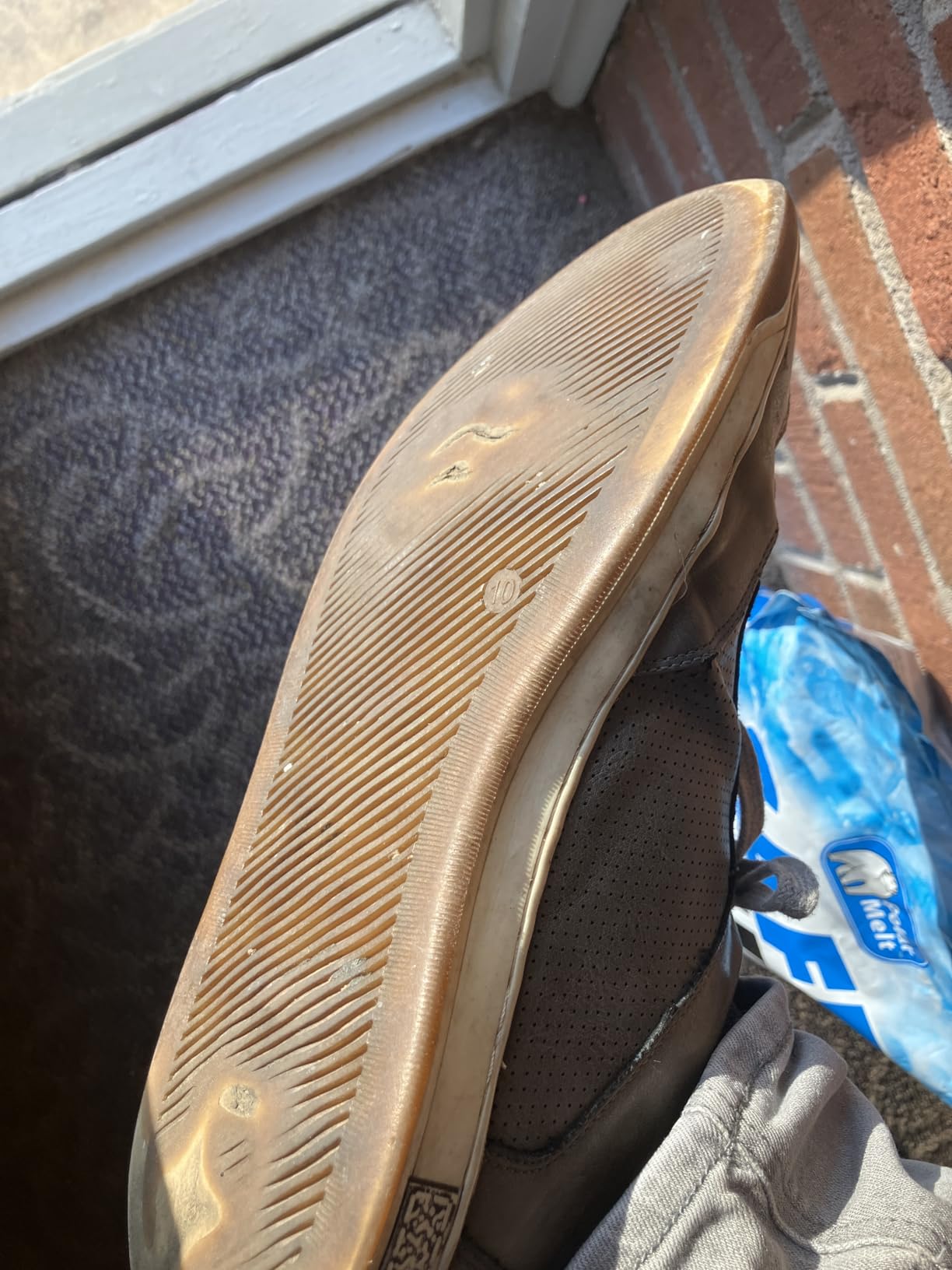 Jousen sneakers after extended wear showing early signs of material stress and wear patterns