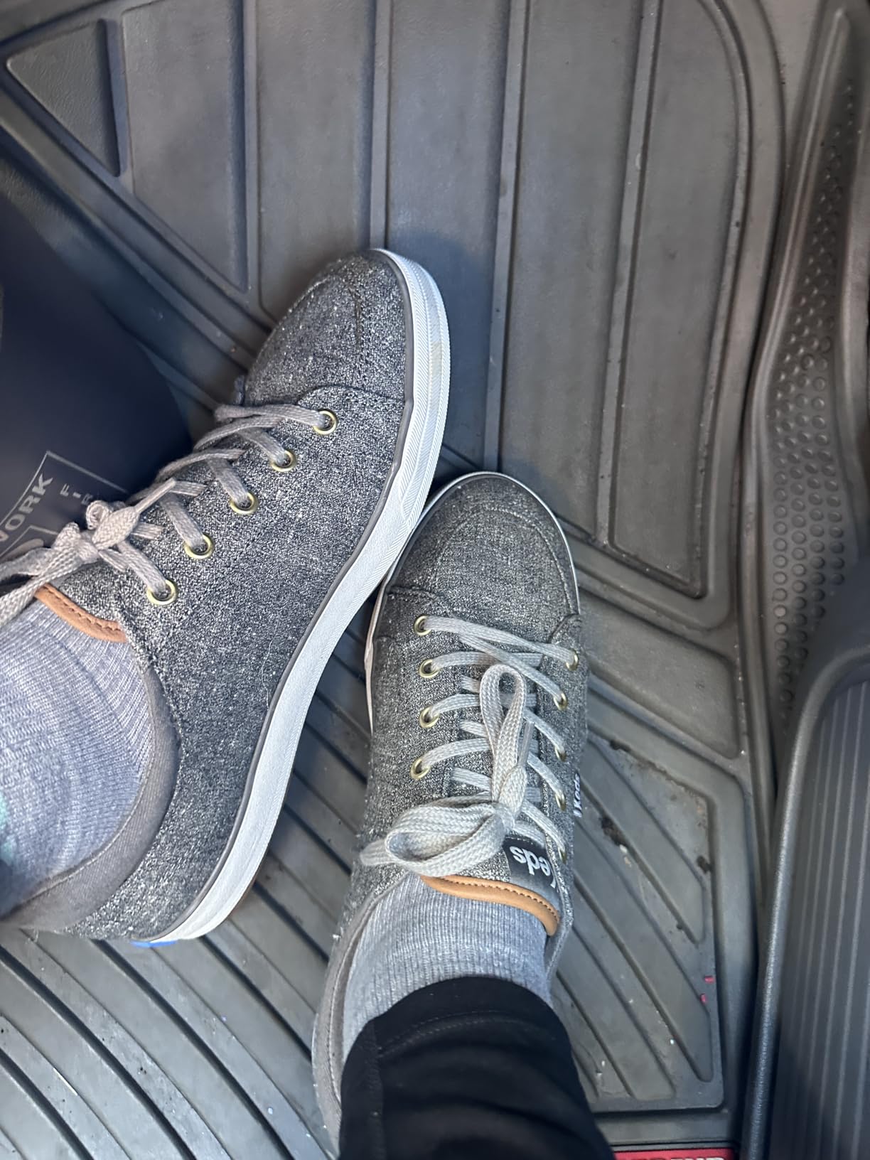 Close-up of Keds Center III lace-up design showing padded collar and fine construction details