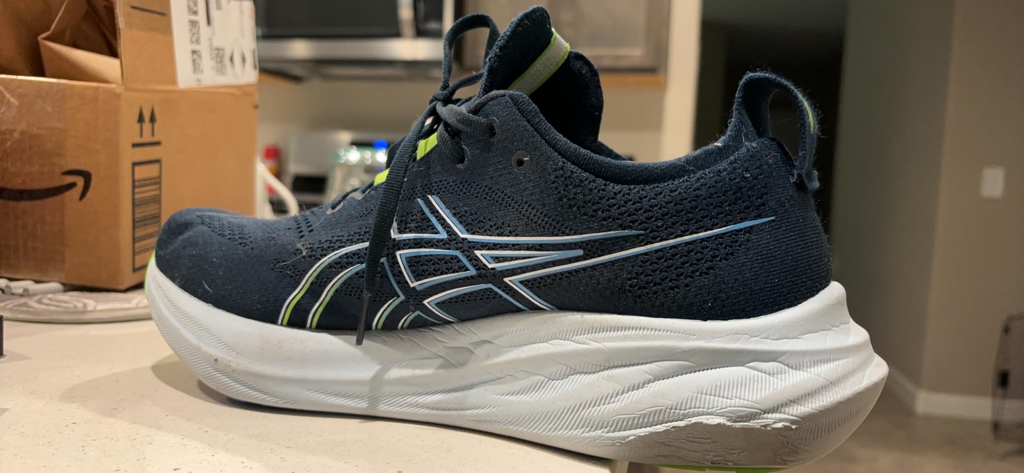 ASICS Gel-Nimbus 26 FF BLAST PLUS ECO midsole foam showing cushioning construction and PureGEL heel insert