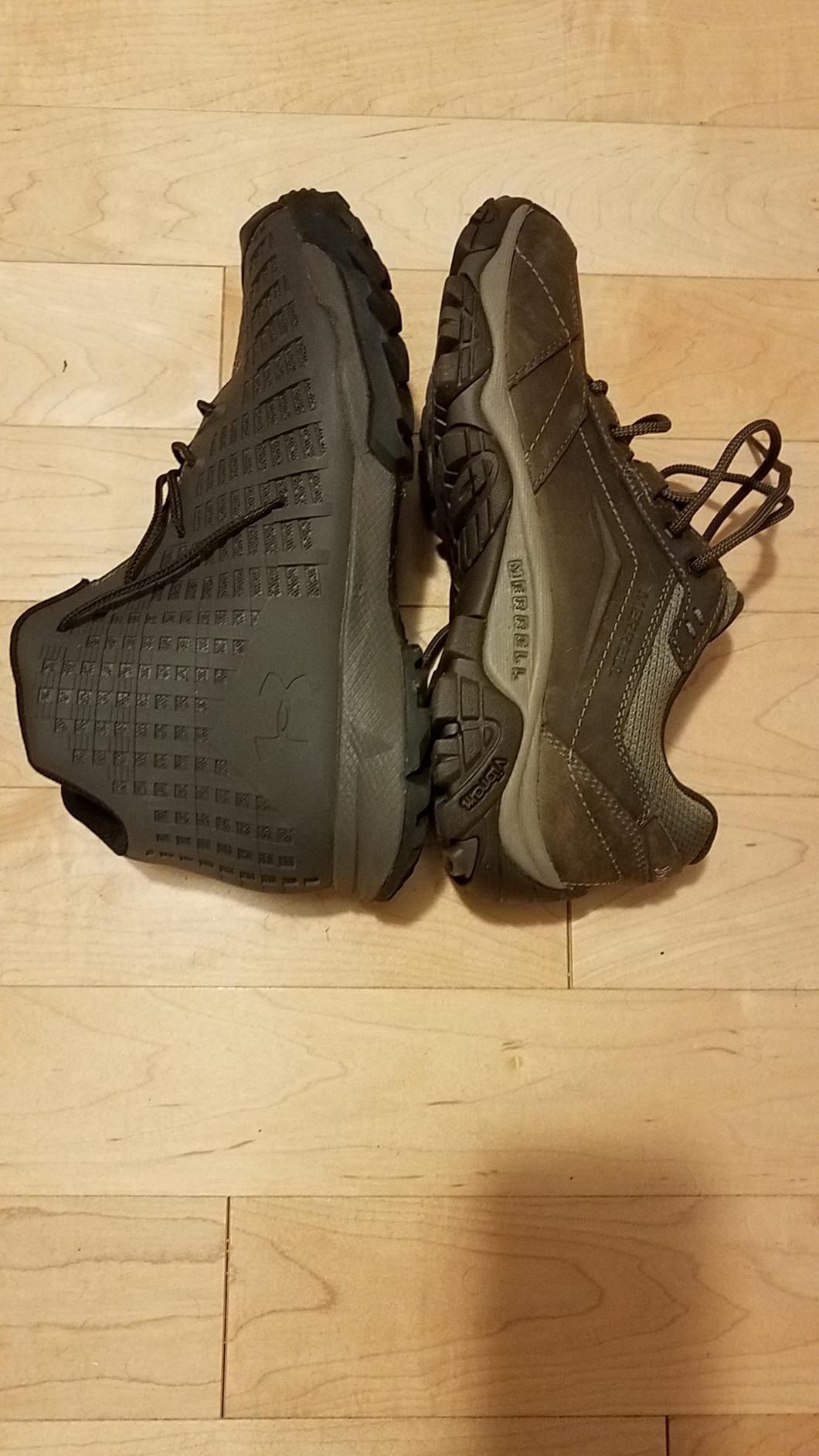Comparison photo examining Merrell Moab Adventure Lace construction and potential durability concern areas