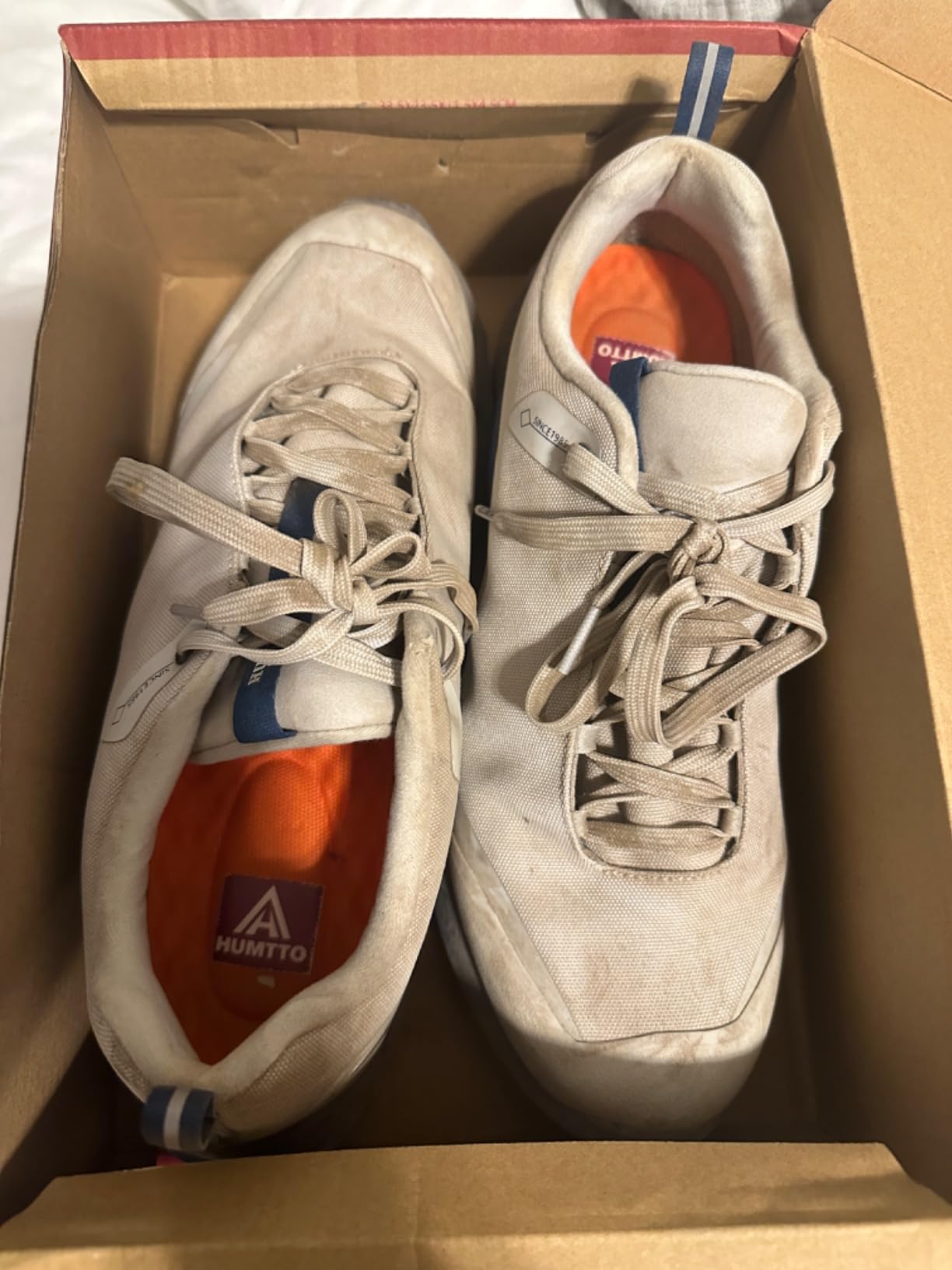 Well-used HUMTTO hiking shoes after weeks of testing showing durability and minimal wear patterns
