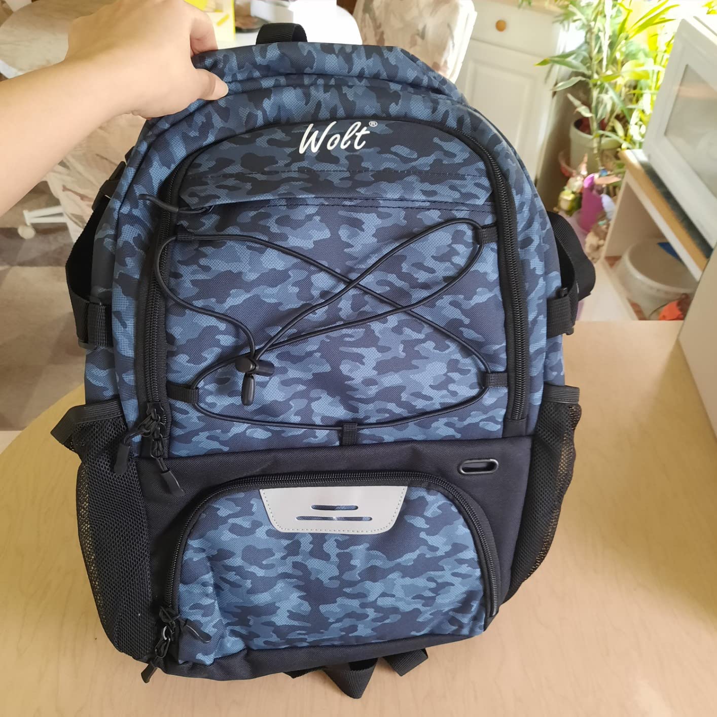 WOLT Basketball Backpack padded shoulder straps and chest strap detail showing ergonomic carry design