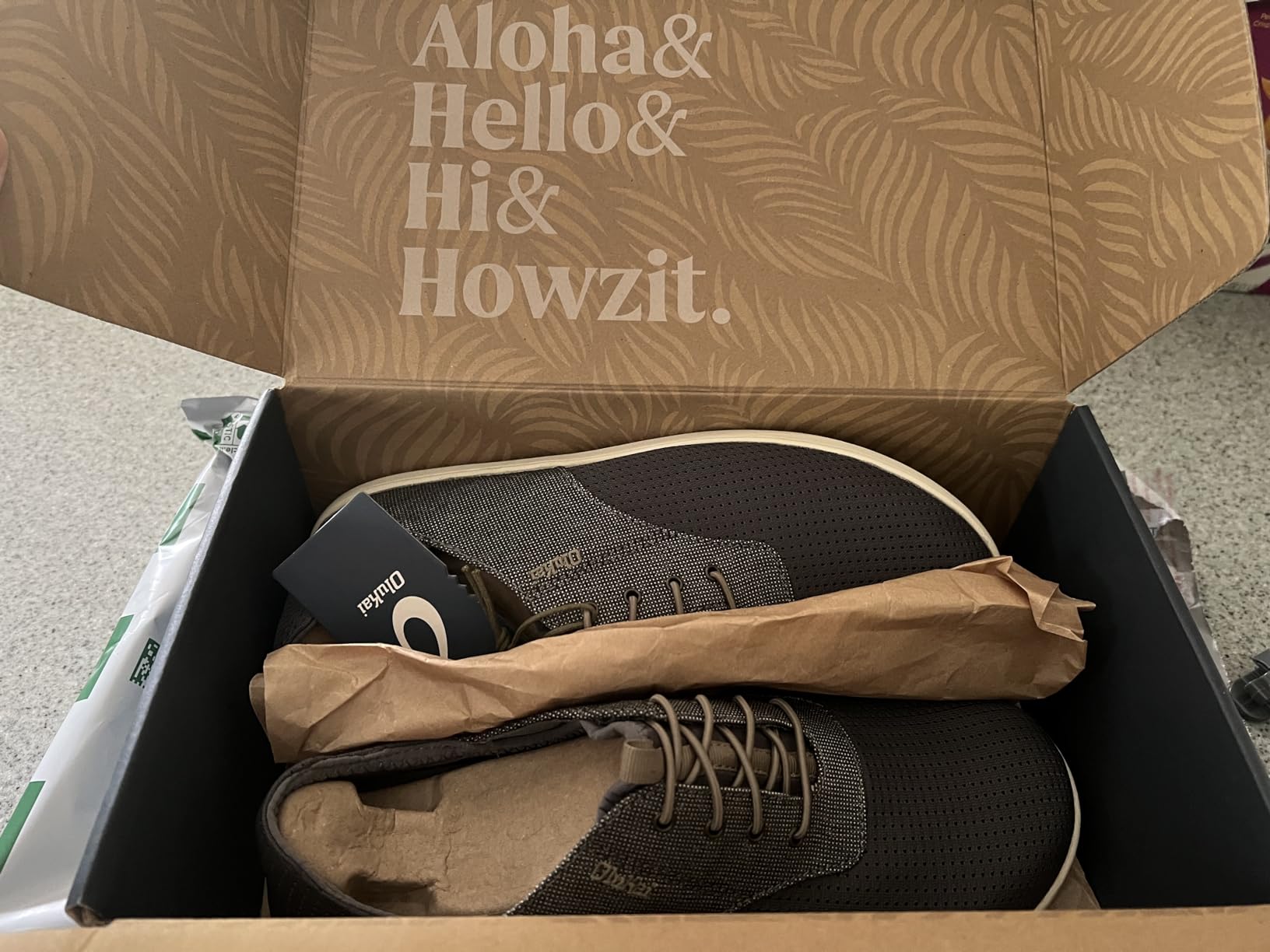 OLUKAI brand quality construction showing Hawaiian-inspired design philosophy and premium materials