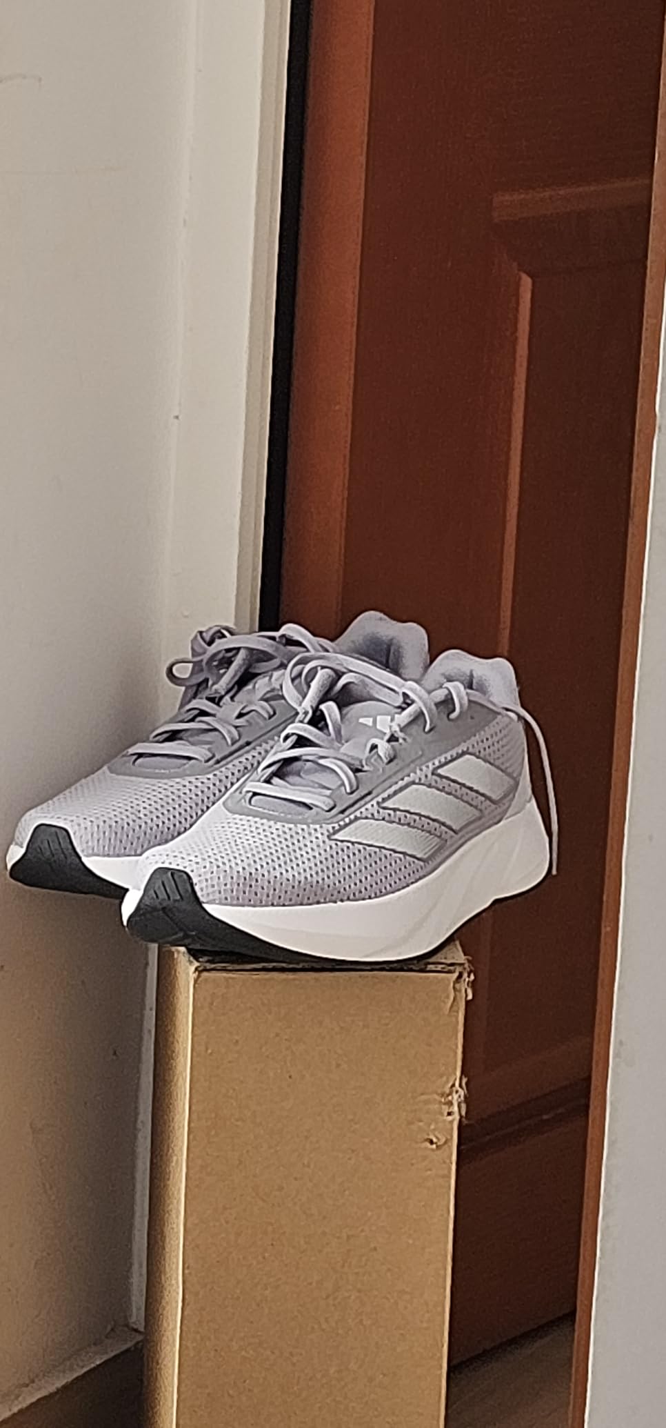 Adidas Duramo SL outsole showing Adiwear rubber tread pattern and wear after 150 miles of testing