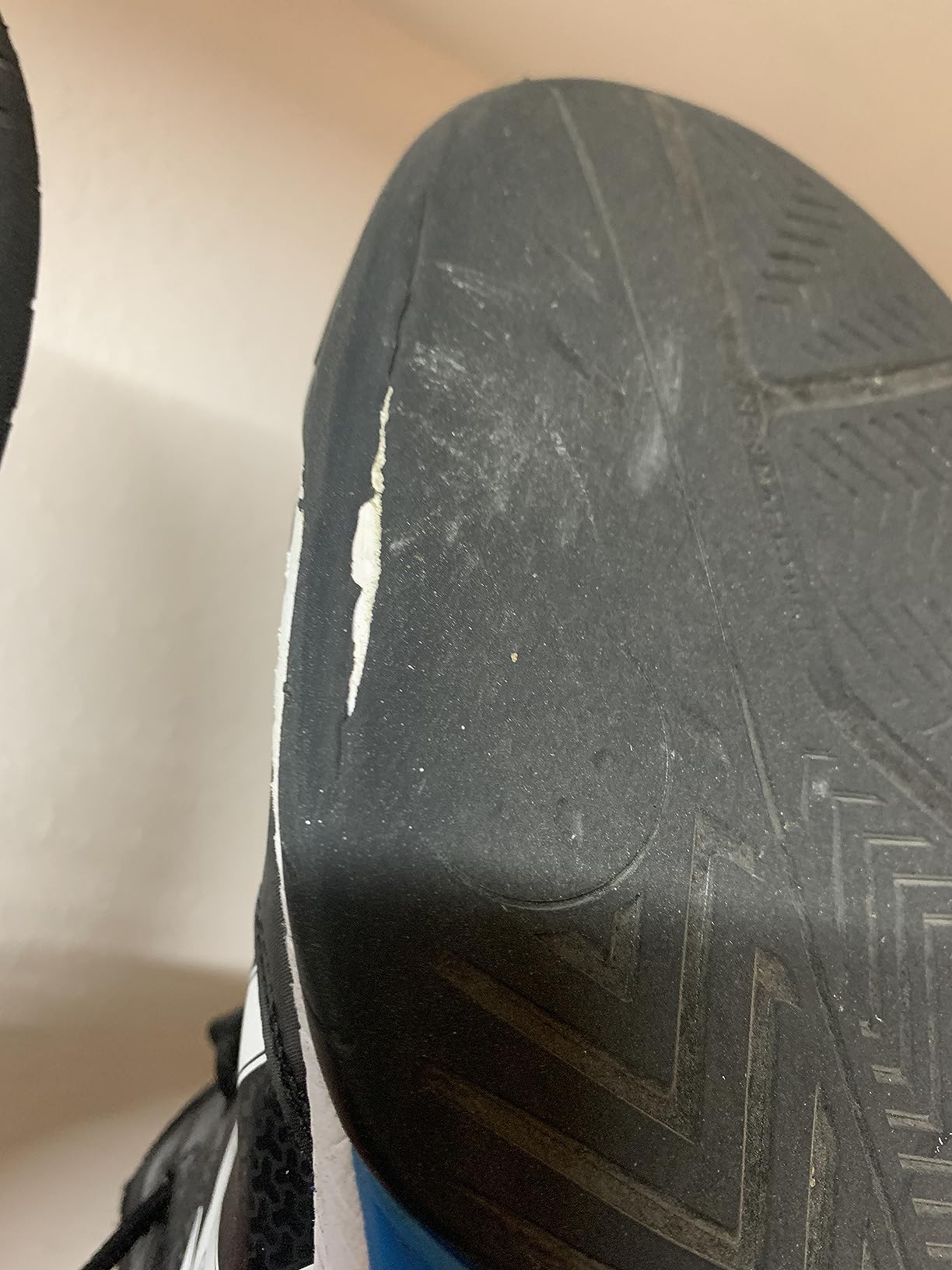 Worn ASICS Gel-Dedicate 7 sole showing early wear patterns after several weeks of court play