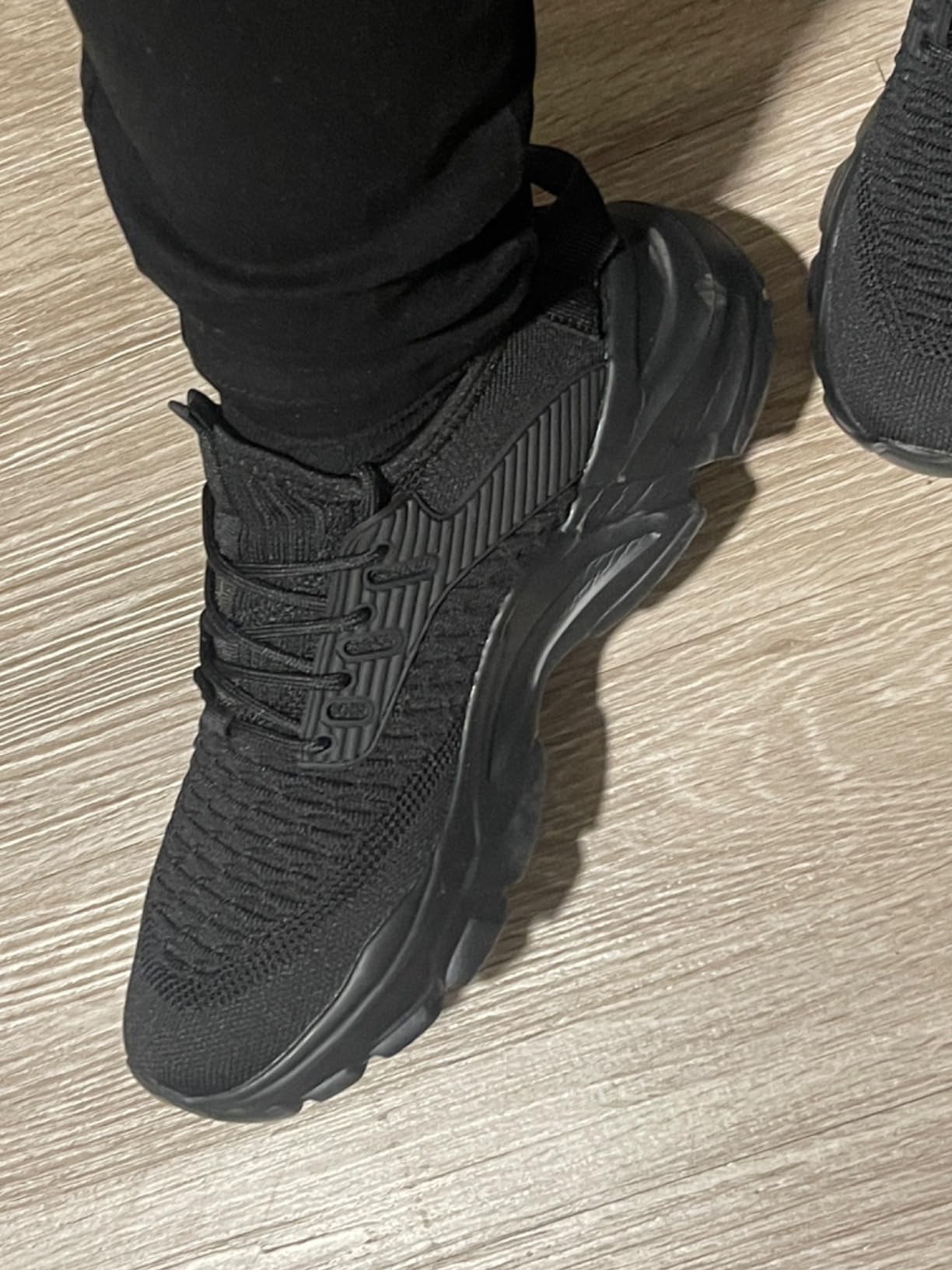 Side profile of KEEZMZ Women's Slip-On Sneaker showing EVA sole construction and memory foam insole depth