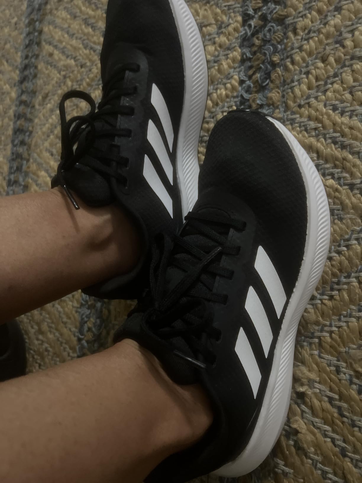 Adidas Runfalcon 3 lifestyle shot showing shoe in real-world context