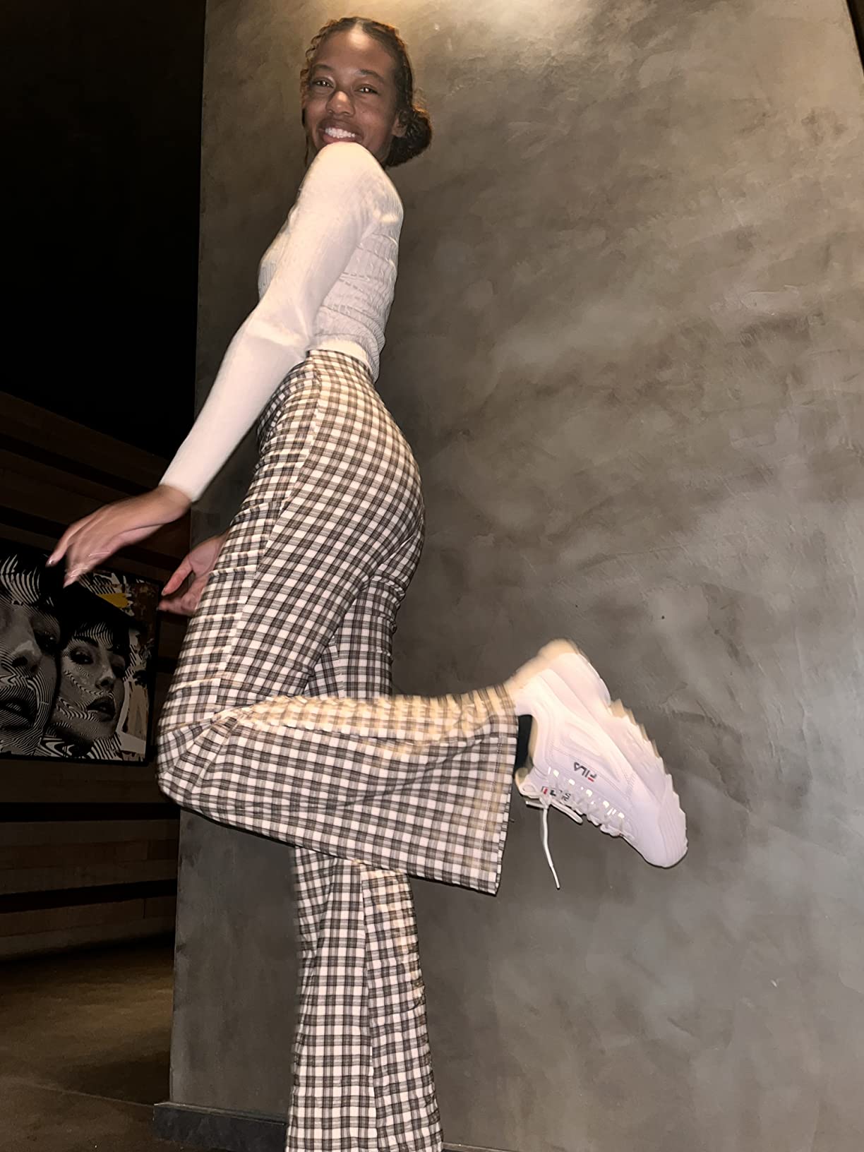 Real-world wear photo of Fila Disruptor II showing daily use context