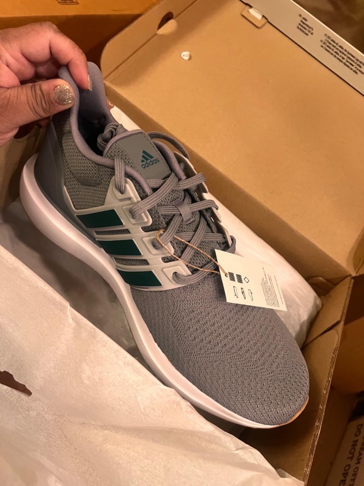 Adidas Ubounce DNA lifestyle shot showing casual styling versatility and everyday outfit pairing options