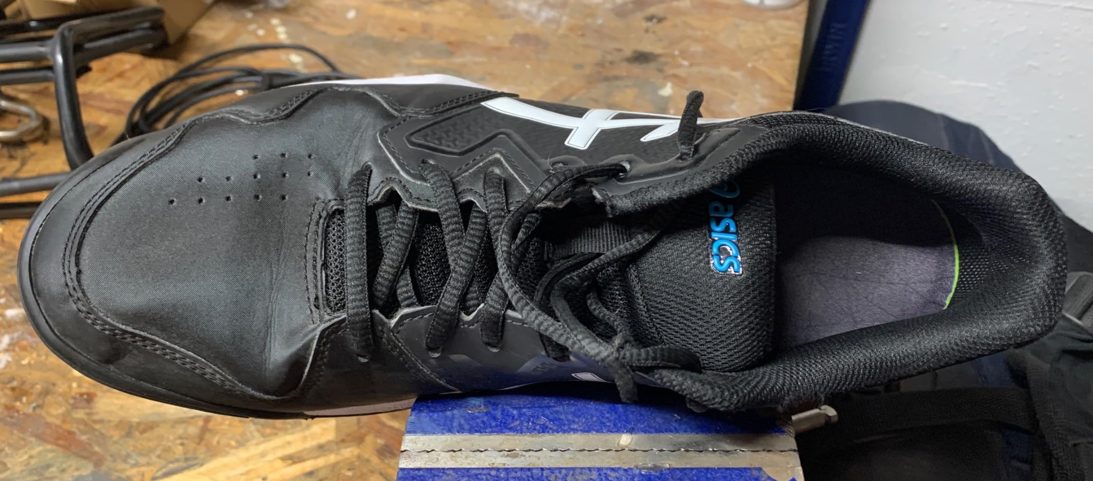 ASICS Gel-Dedicate 7 showing significant sole wear and durability issues after regular court use