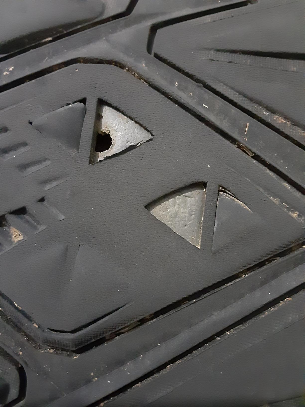 Camel Crown outsole showing 5mm aggressive lug pattern and rubber tread design