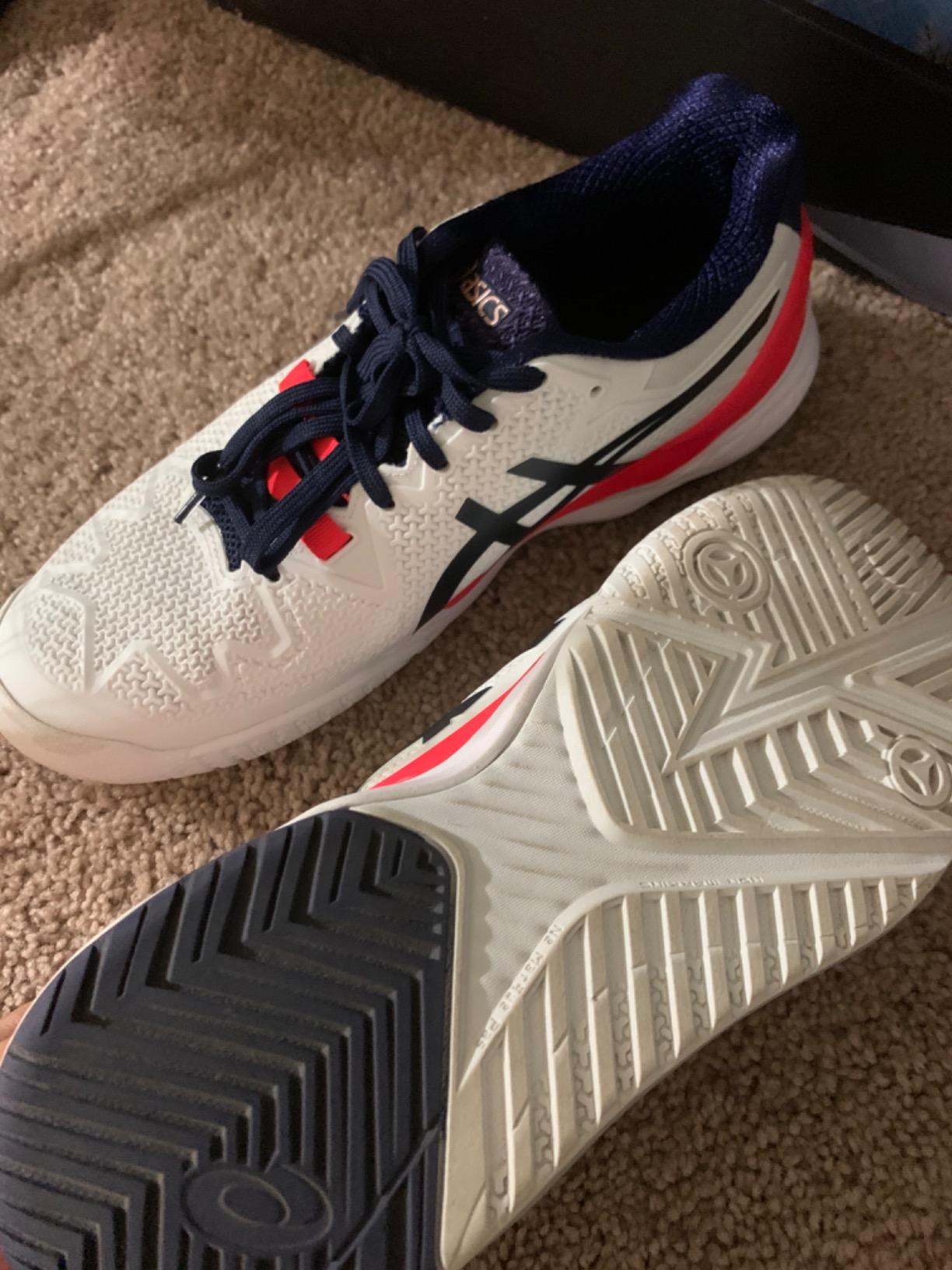 Sole view of ASICS Women's Gel-Resolution 8 showing AHAR Plus rubber compound and modified herringbone traction pattern