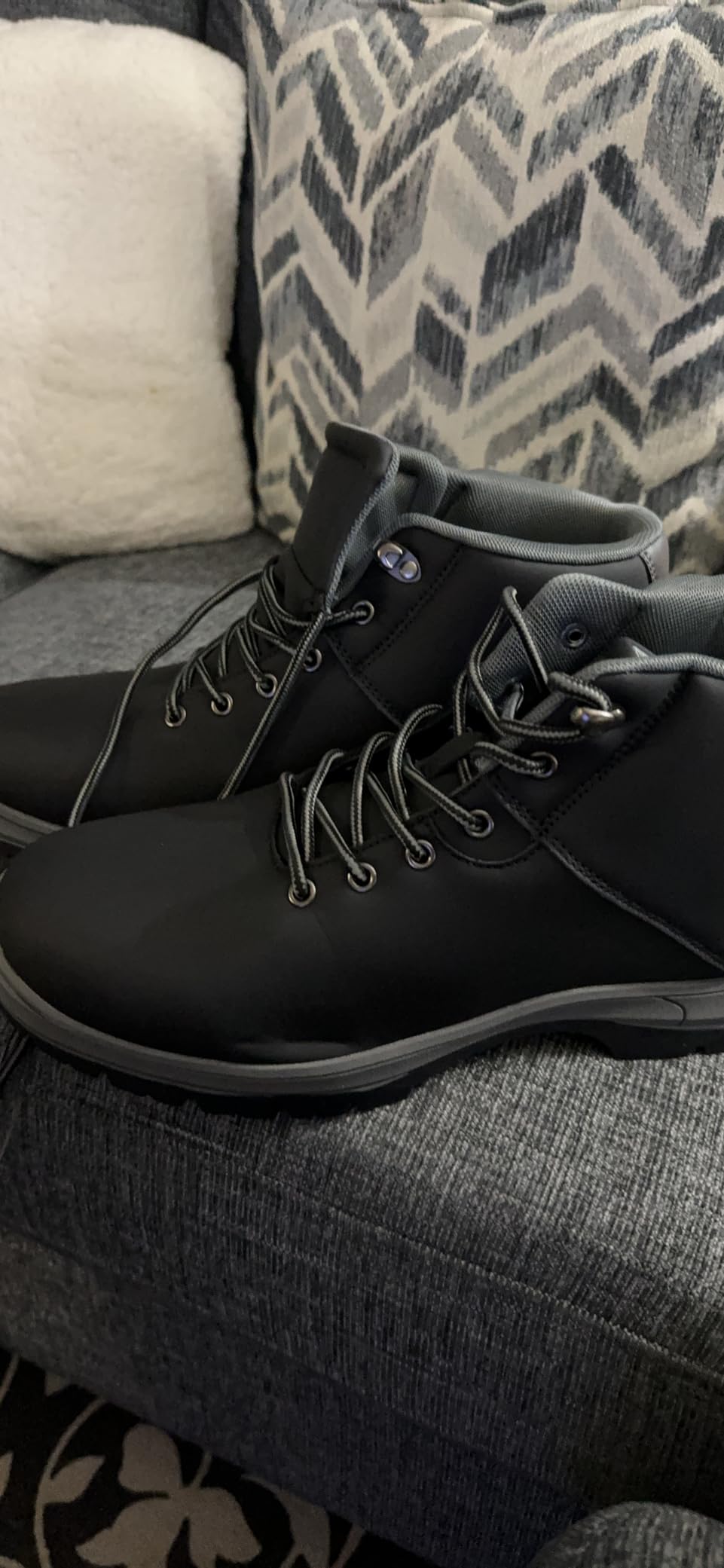 Testing CARENURSE boots in various outdoor conditions including light rain and puddles