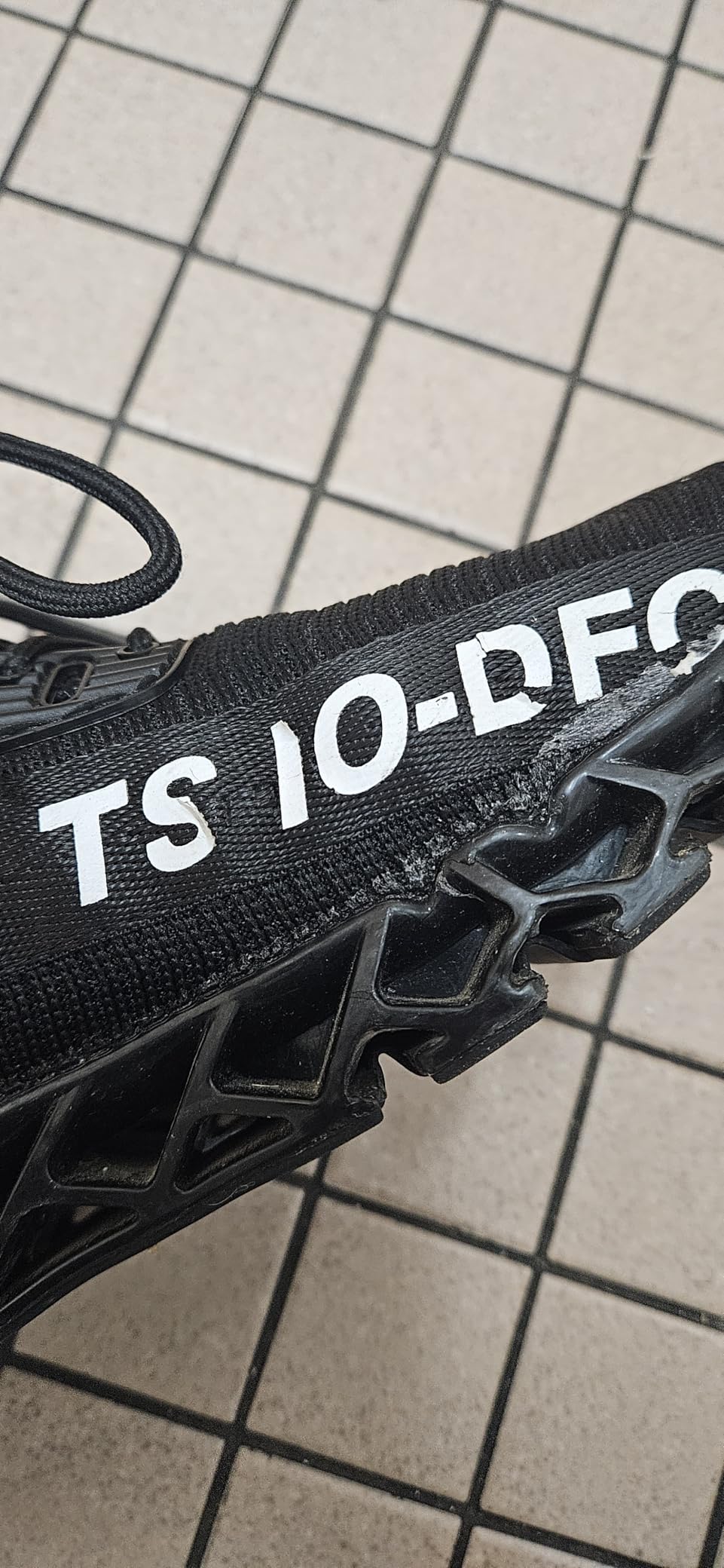 Close-up of FRSHANIAH sneaker mesh upper and sole attachment construction quality