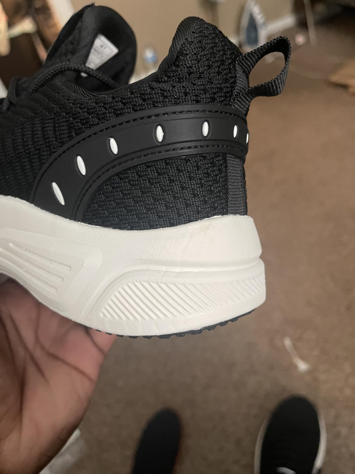 Side profile of Feethit mens shoes showing lightweight construction and heel area
