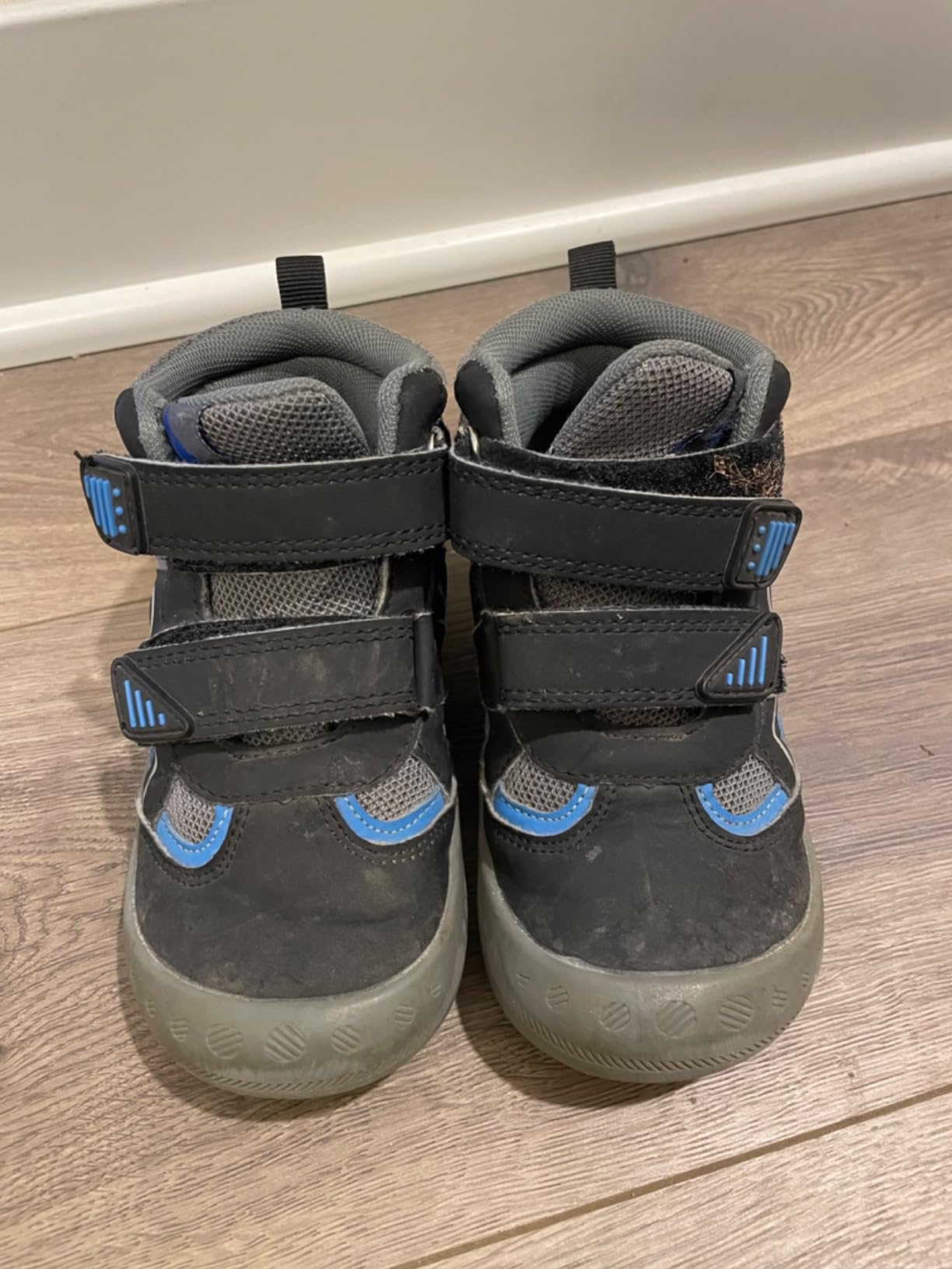 Side profile of Mishansha kids hiking boot showing water resistant upper material and ankle support height