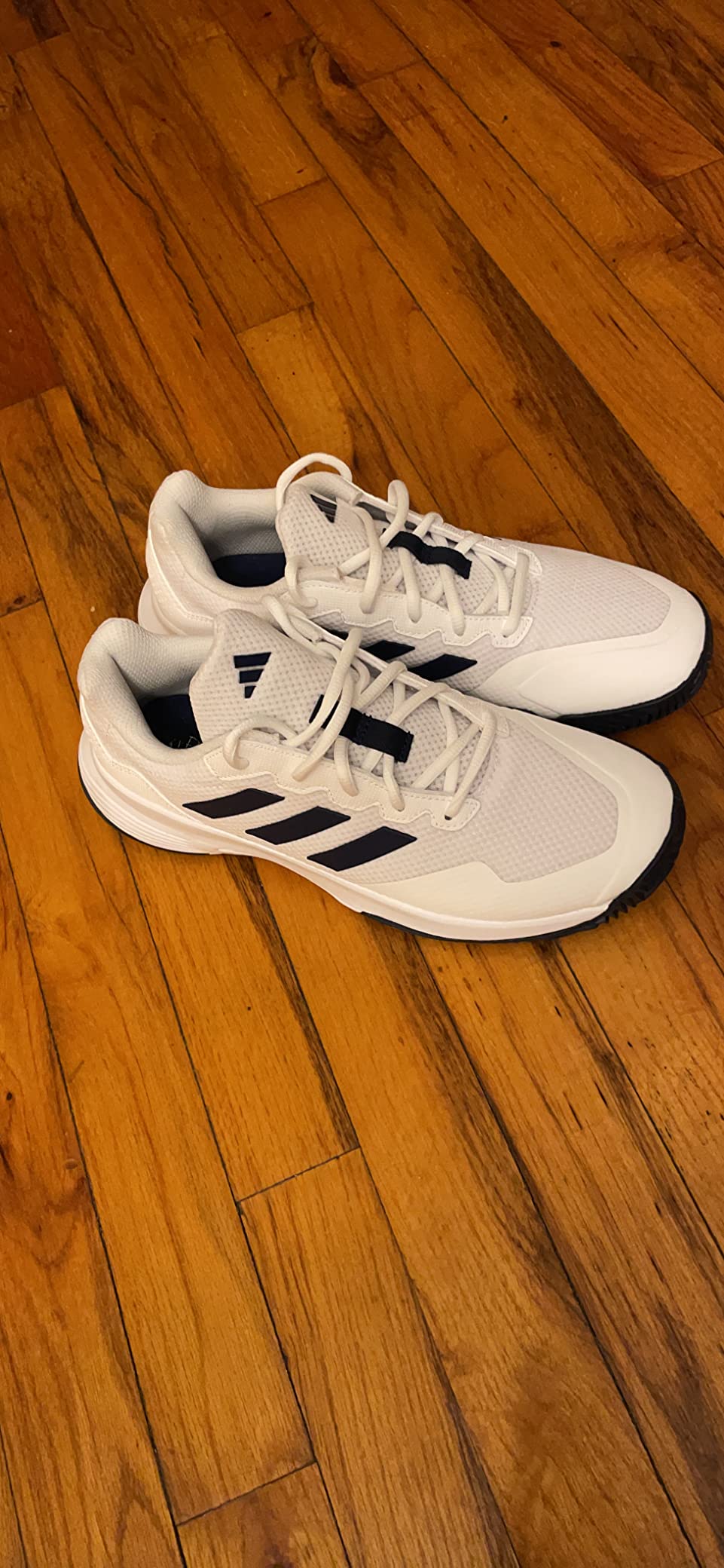 Adidas Gamecourt M outsole showing Adiwear rubber tread pattern designed for multi-directional court grip