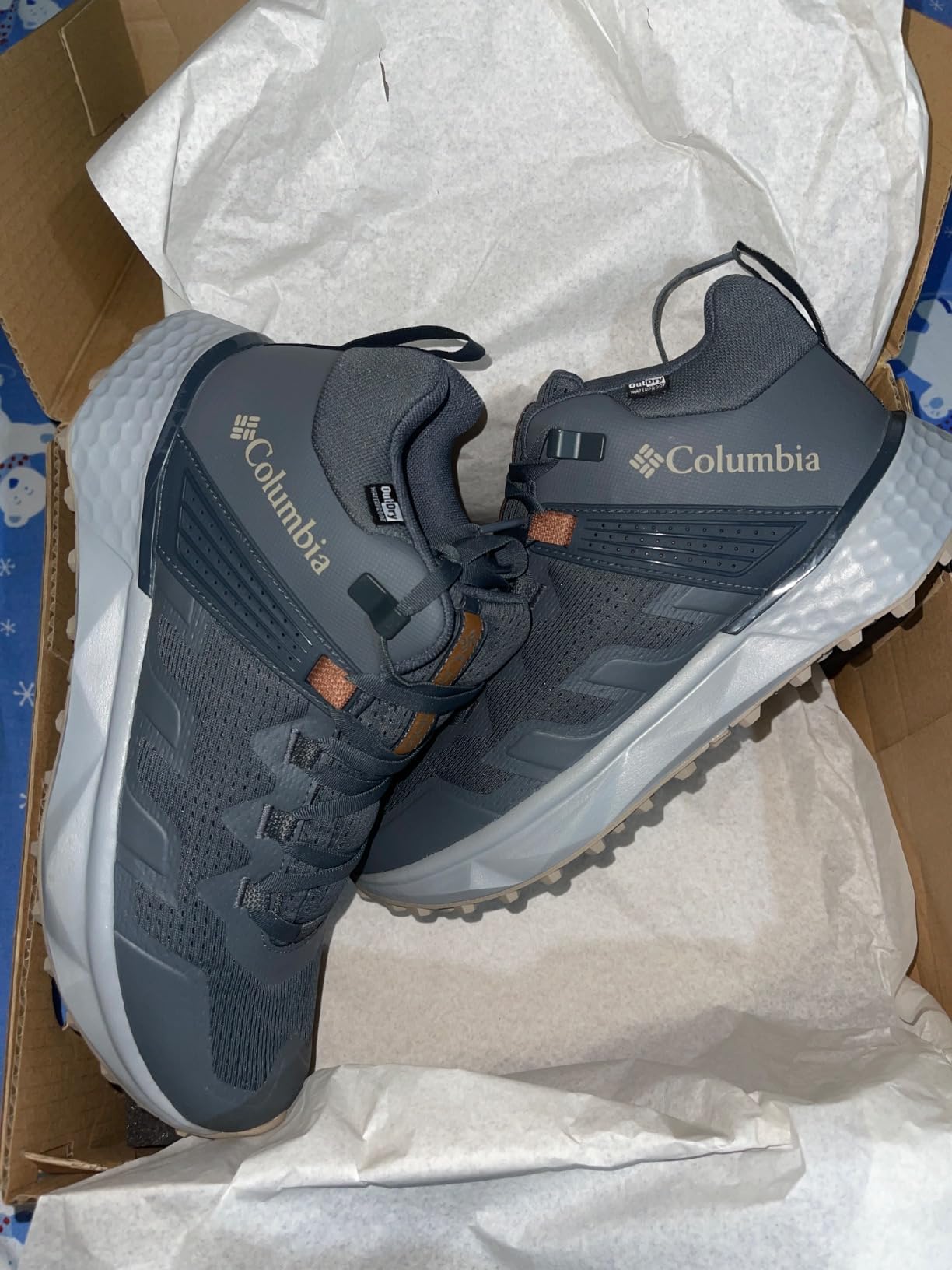 Columbia Men's Facet 75 Mid Outdry Hiking Shoe in Graphite Canvas Tan colorway showing waterproof construction