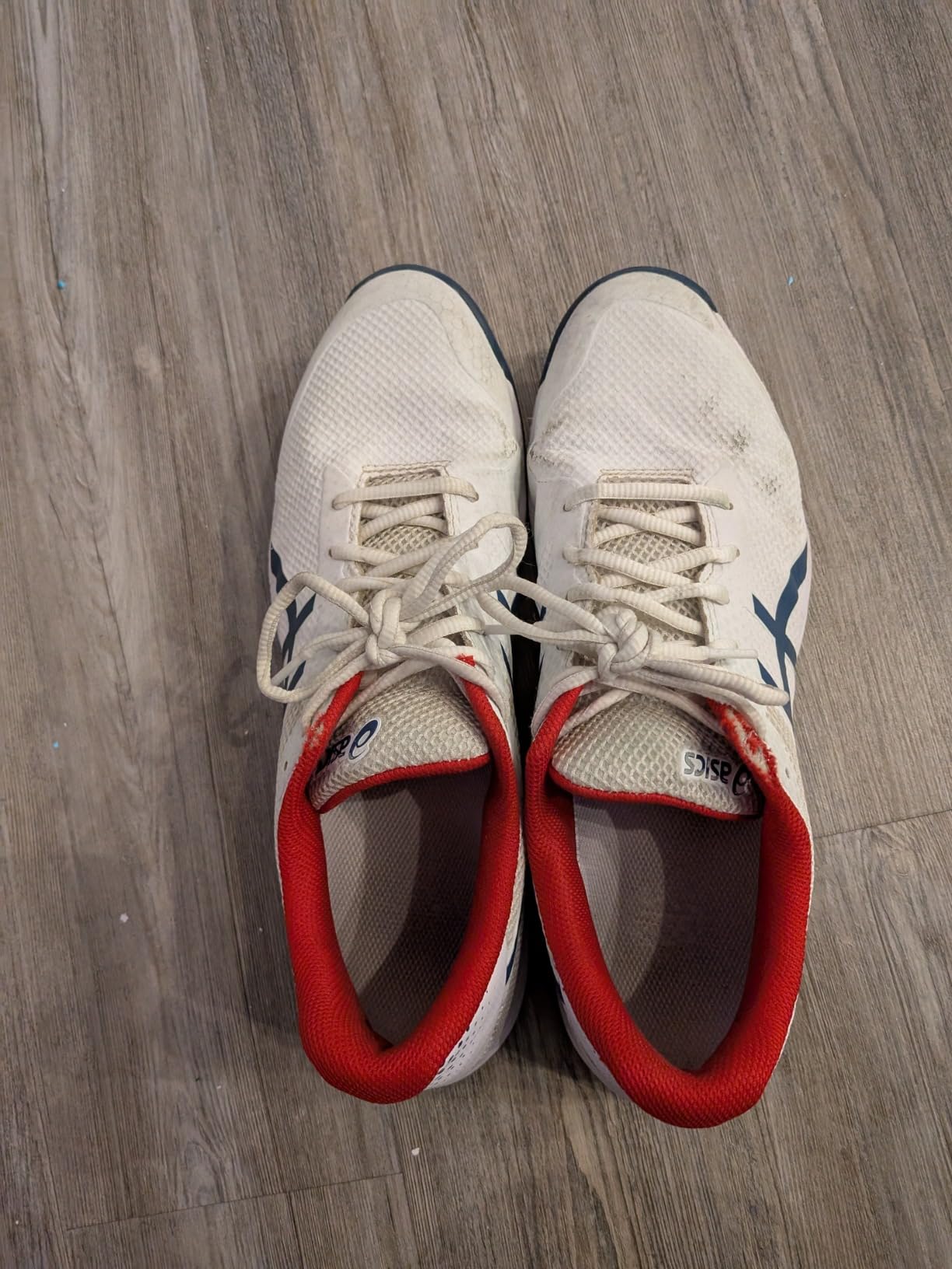 ASICS Men's Gel-Game 9 black and white colorway pickleball tennis shoe on court