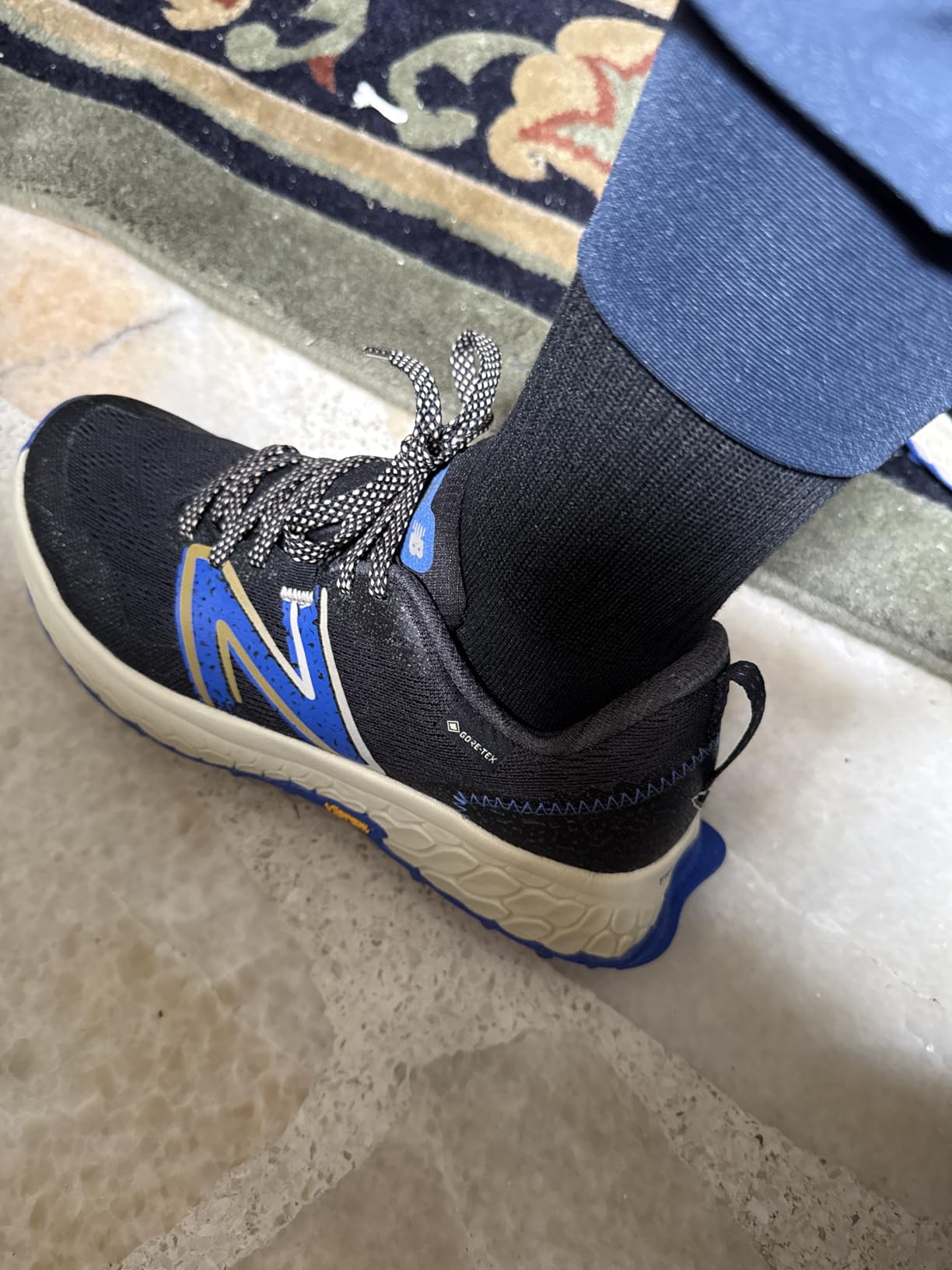 New Balance Hierro V7 upper detail showing synthetic mesh construction and no-sew overlay reinforcement