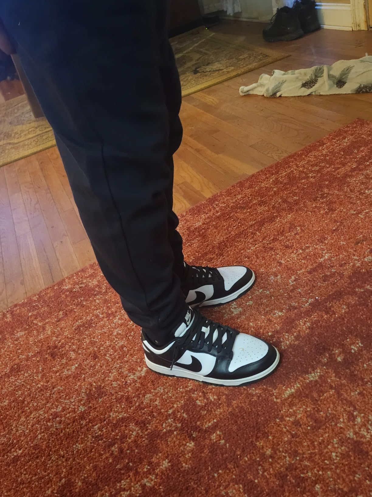 Nike Dunk Low leather upper construction showing quality stitching and Nike swoosh detail