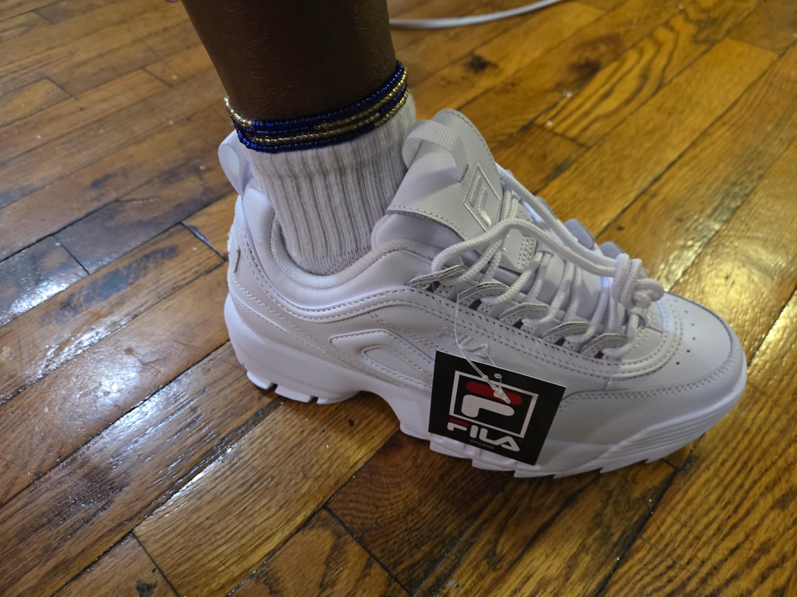 Fila Women's Disruptor II final product shot showing overall design appeal and classic white colorway construction