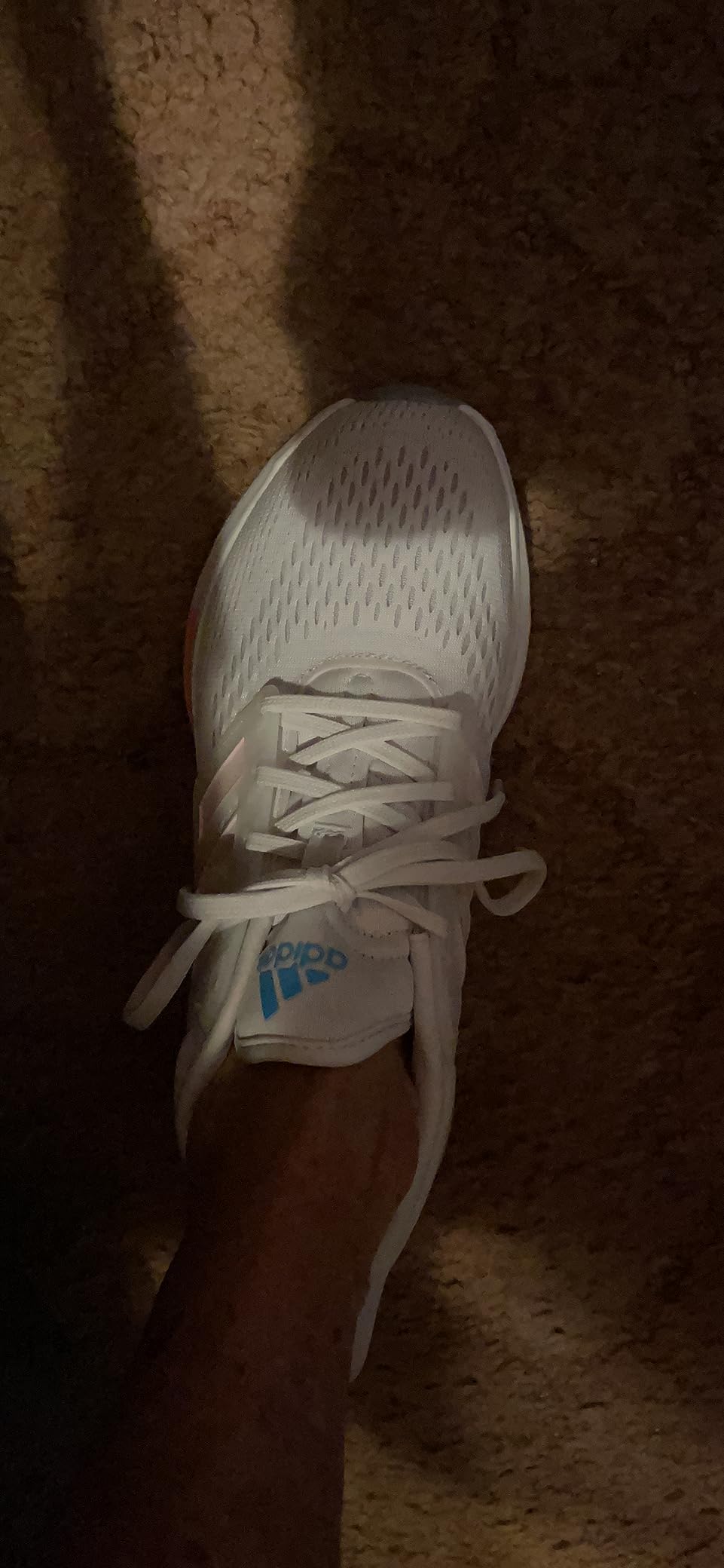 adidas Eq21 being worn during daily lifestyle activities showing versatile styling for multiple use cases