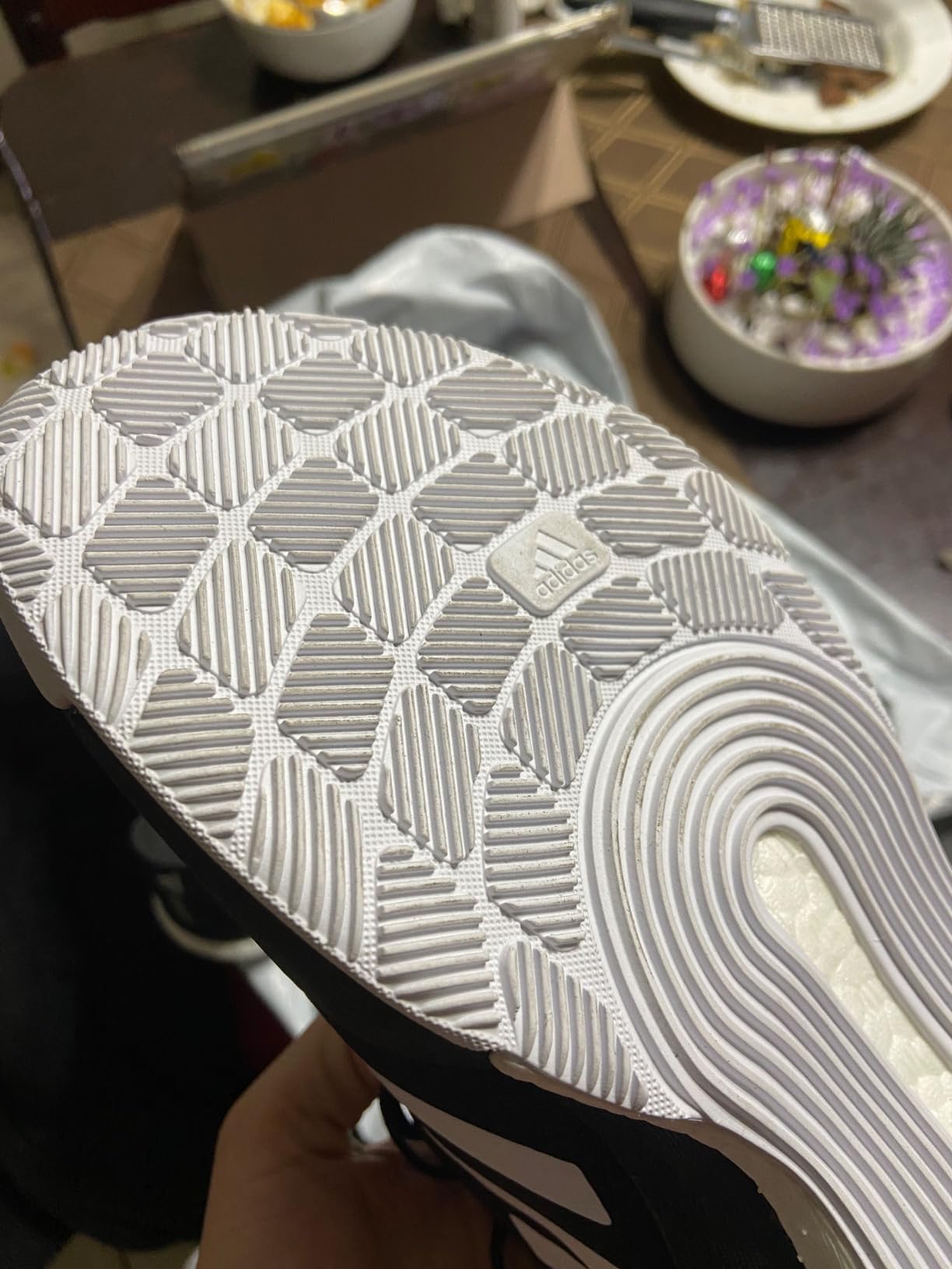 Adidas Women's Crazyflight volleyball shoes white colorway on court showing BOOST midsole profile and clean design