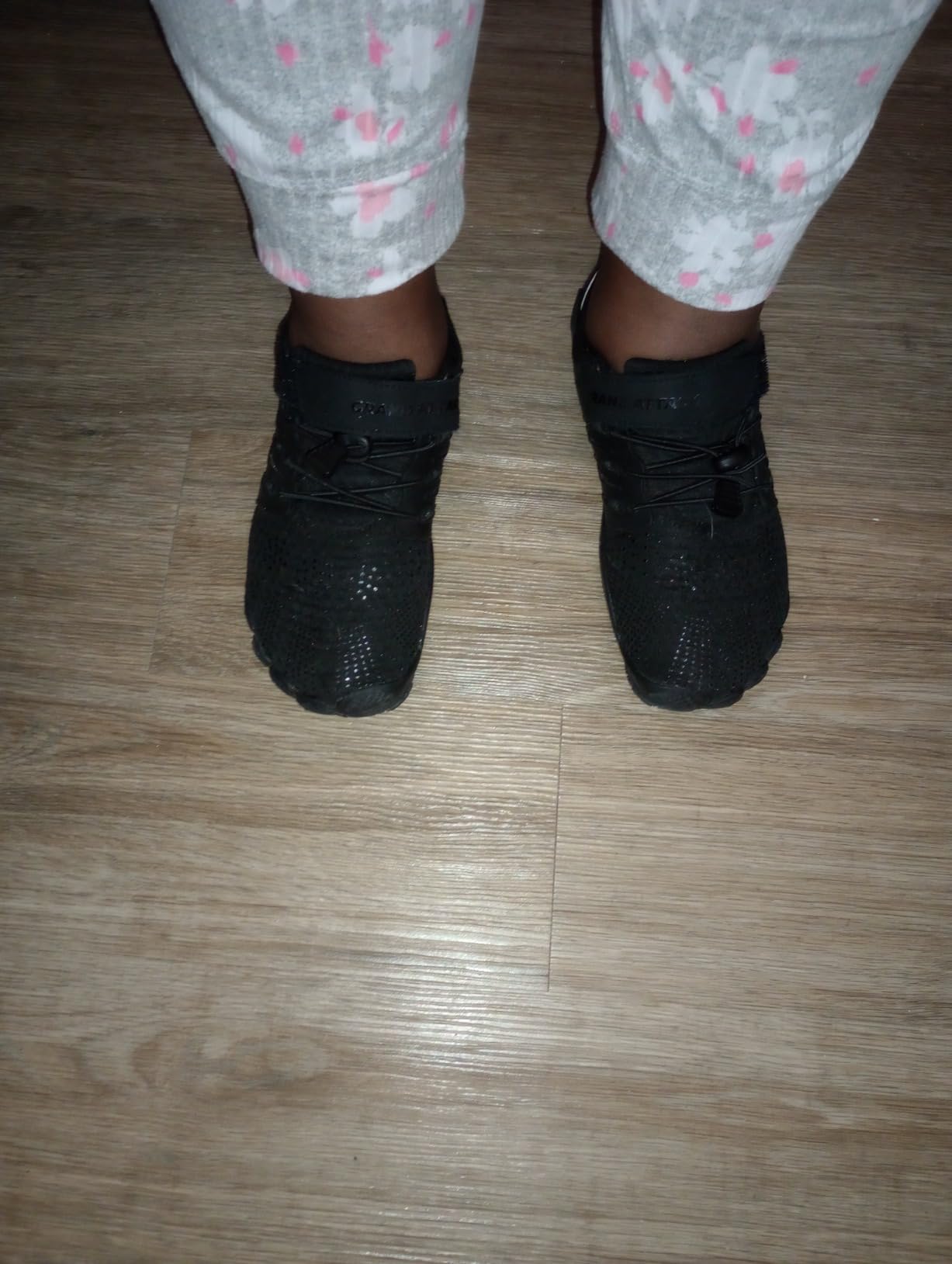 Grand Attack barefoot shoes on feet showing natural toe spread and ground contact positioning