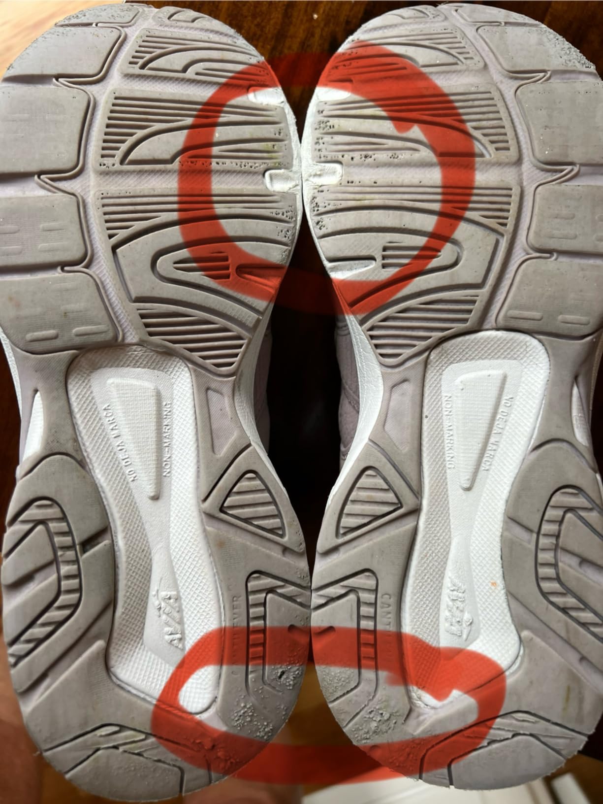 Close-up of Avia Verge sole showing exposed midsole foam and deteriorated tread pattern after intensive use