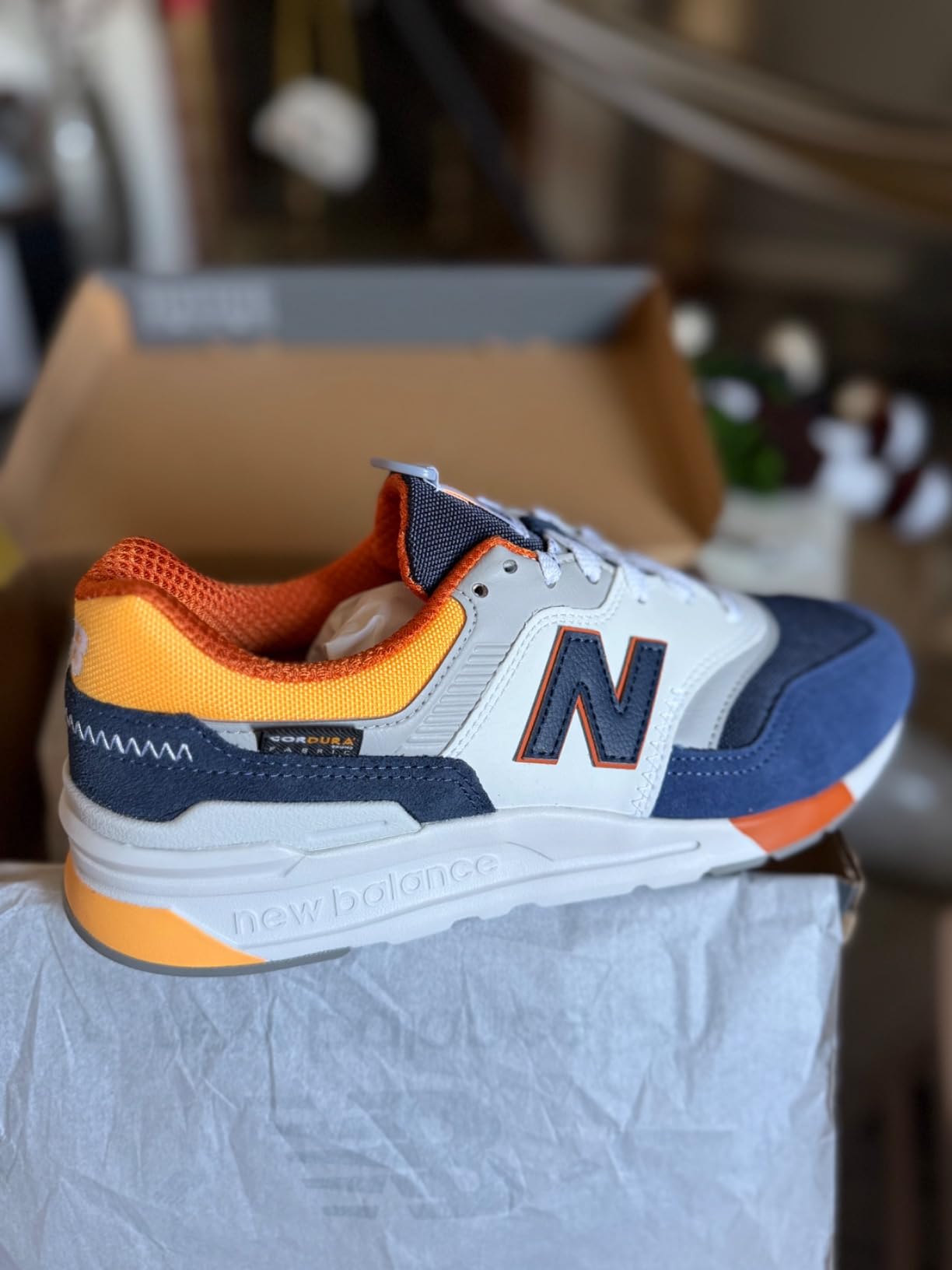 New Balance 997H worn in casual setting showing suede quality and overall construction