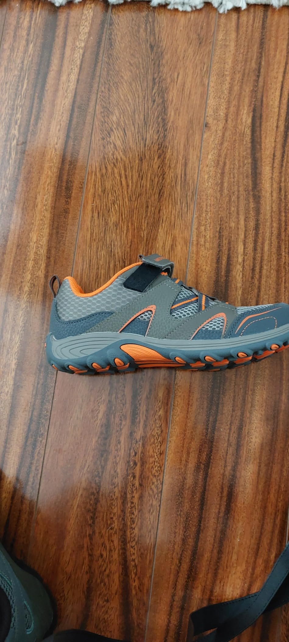 Merrell Trail Chaser Velcro strap failure showing hook section delaminating from shoe body