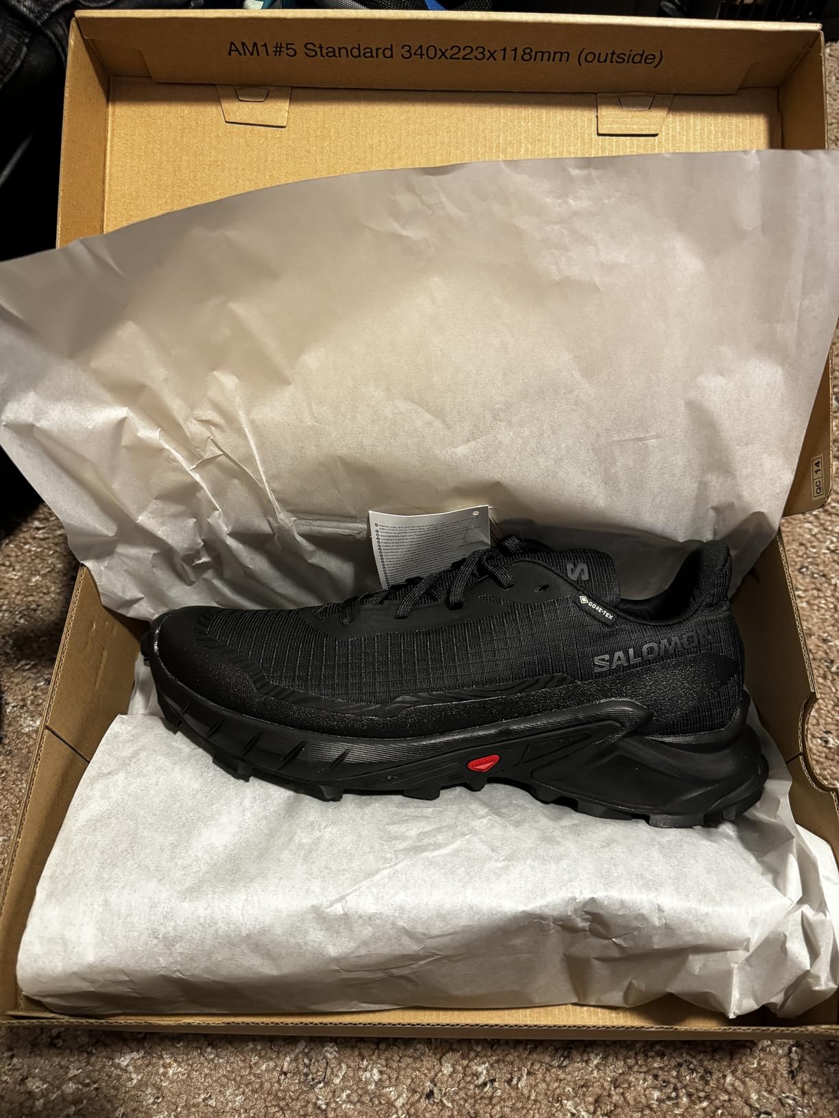 Salomon Alphacross 5 Gore-Tex on foot showing fit and comfort during trail wear