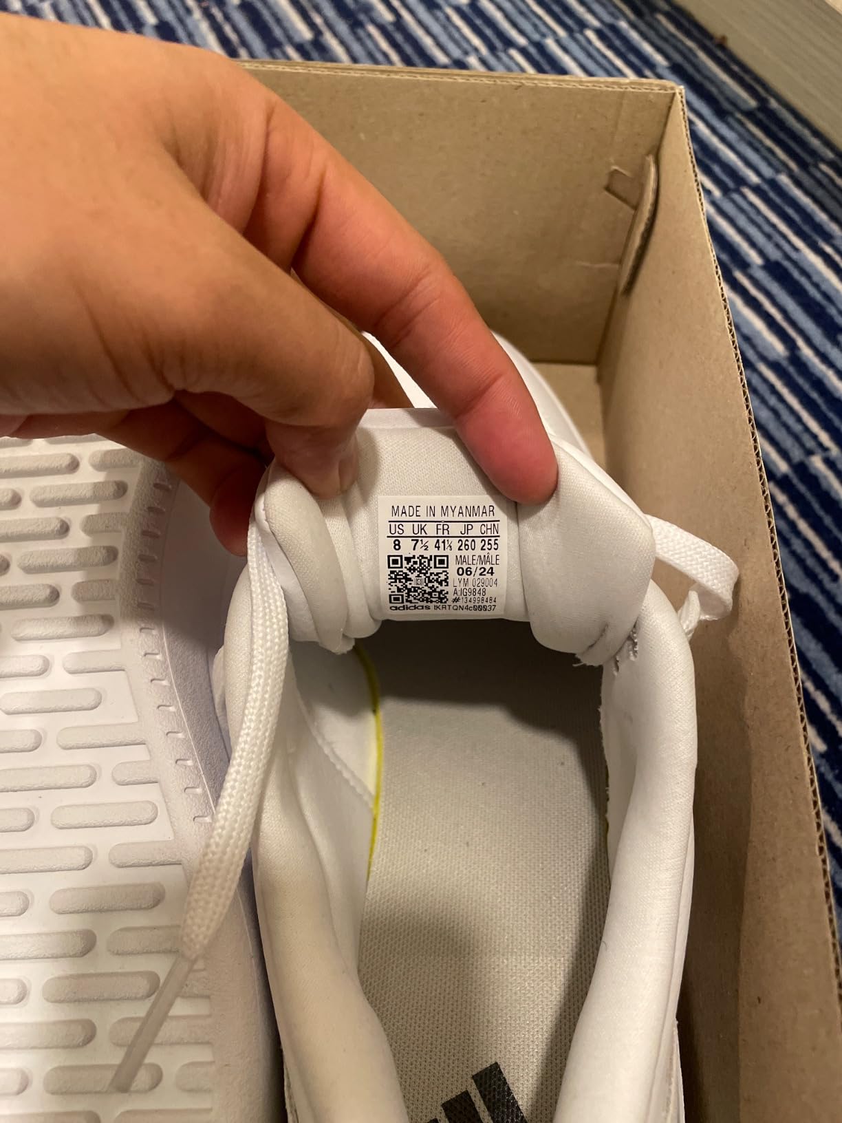 Close-up of Adidas Cloudfoam insole technology showing two-layer cushioning system