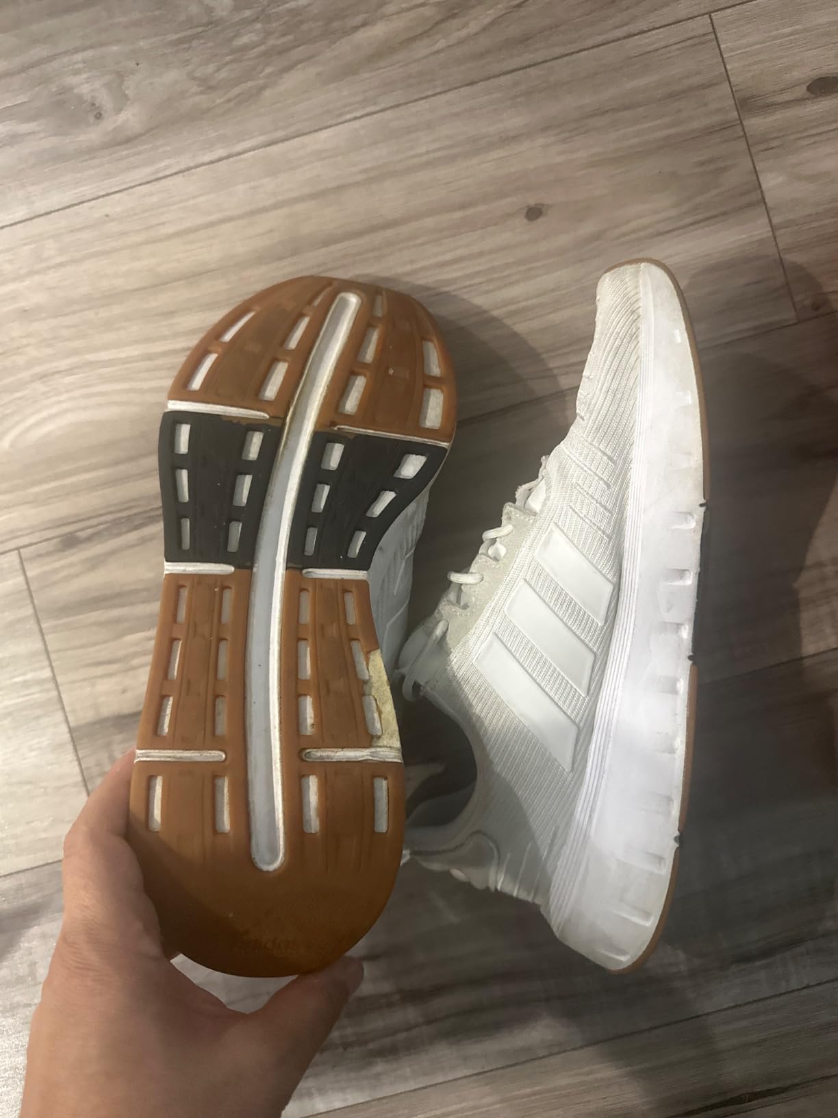 Adidas Swift Run sole separation visible between upper and midsole after several weeks of daily use