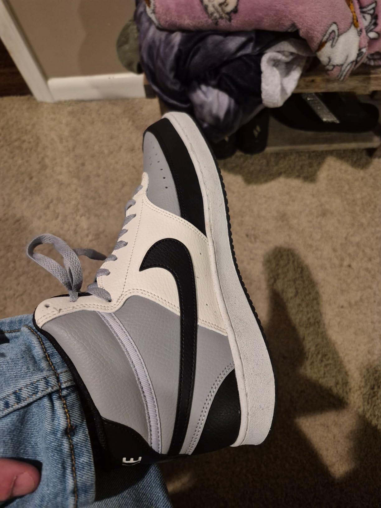 Nike Court Vision Mid toe box perforations and lacing system showing breathability design detail
