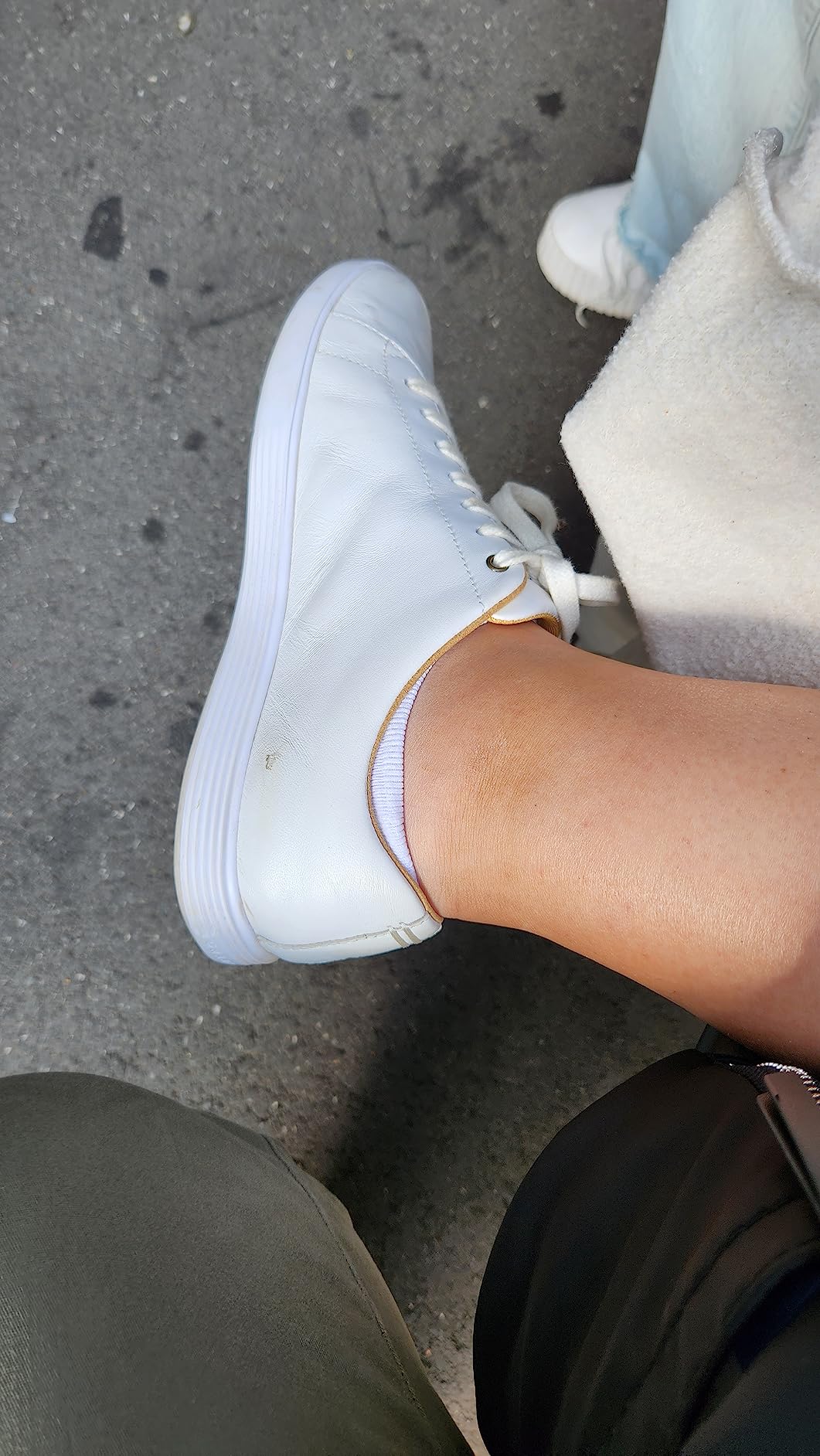 Cole Haan Grand Crosscourt sneakers worn during European travel on cobblestone streets