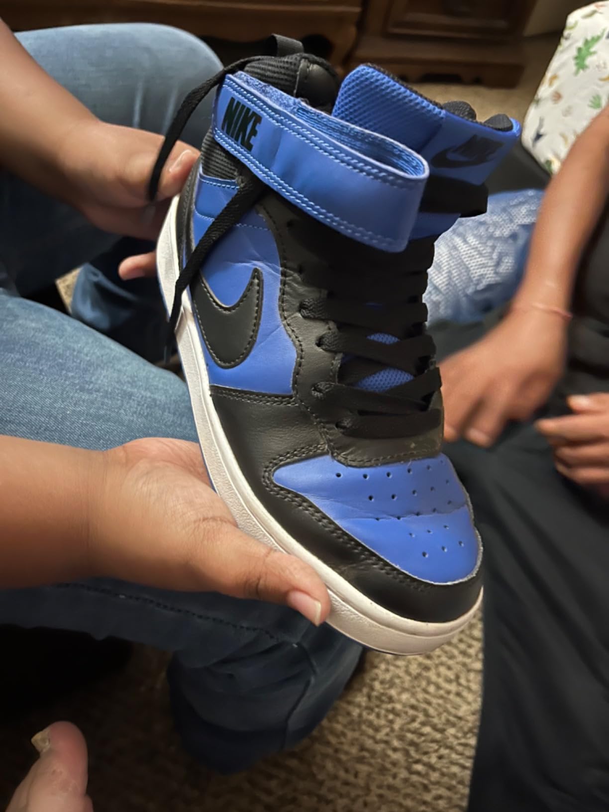 Customer showing UpUGo replacement laces successfully refreshing appearance of older sneakers