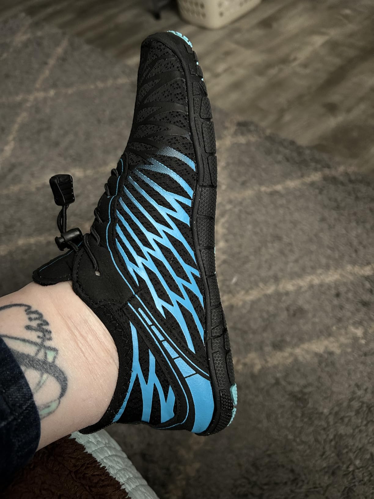ELETON barefoot shoe in active use showing flexibility during exercise movement
